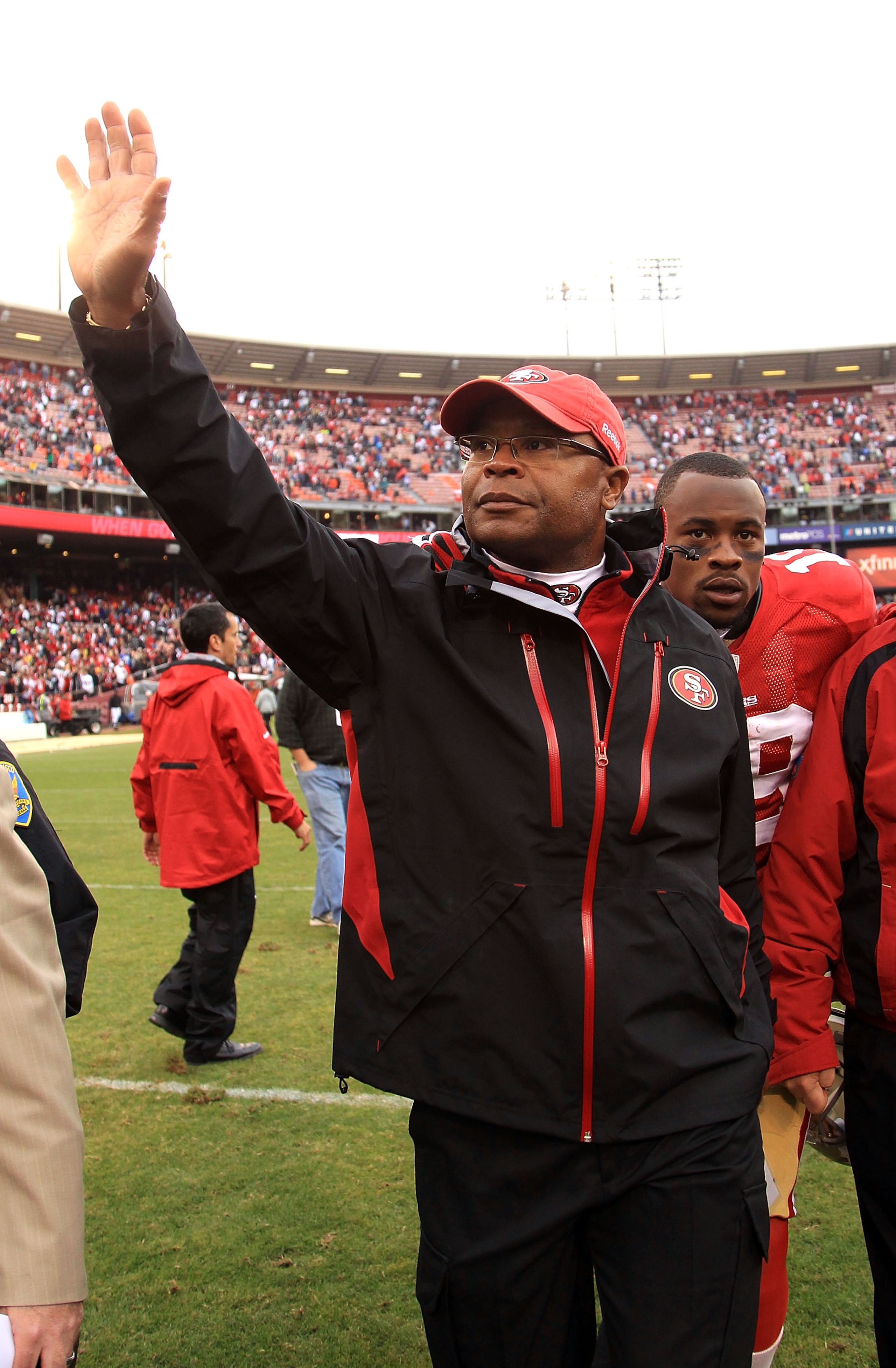 SAN FRANCISCO - OCTOBER 17:  Head coach Mike Singletary of the San Francisco 49ers waves to the crowd after they beat the Oakland Raiders at Candlestick Park on October 17, 2010 in San Francisco, California.  (Photo by Ezra Shaw/Getty Images)