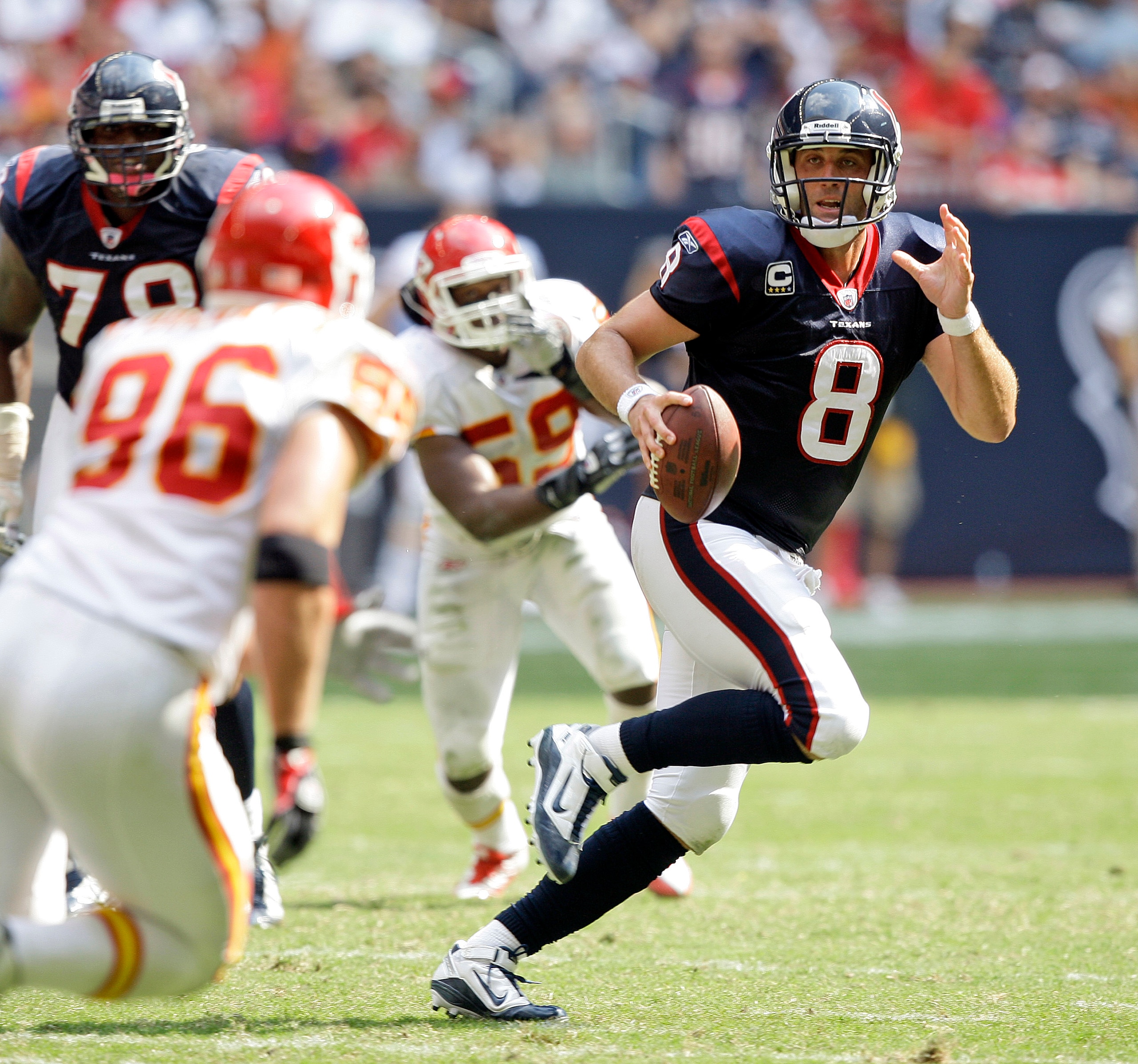 HOUSTON - OCTOBER 17:  Quarterback Matt Schaub #8 of the Houton Texans scrambles out of the pocket as he looks for a receiver agasint the Kasnas City Chiefs at Reliant Stadium on October 17, 2010 in Houston, Texas.  (Photo by Bob Levey/Getty Images)
