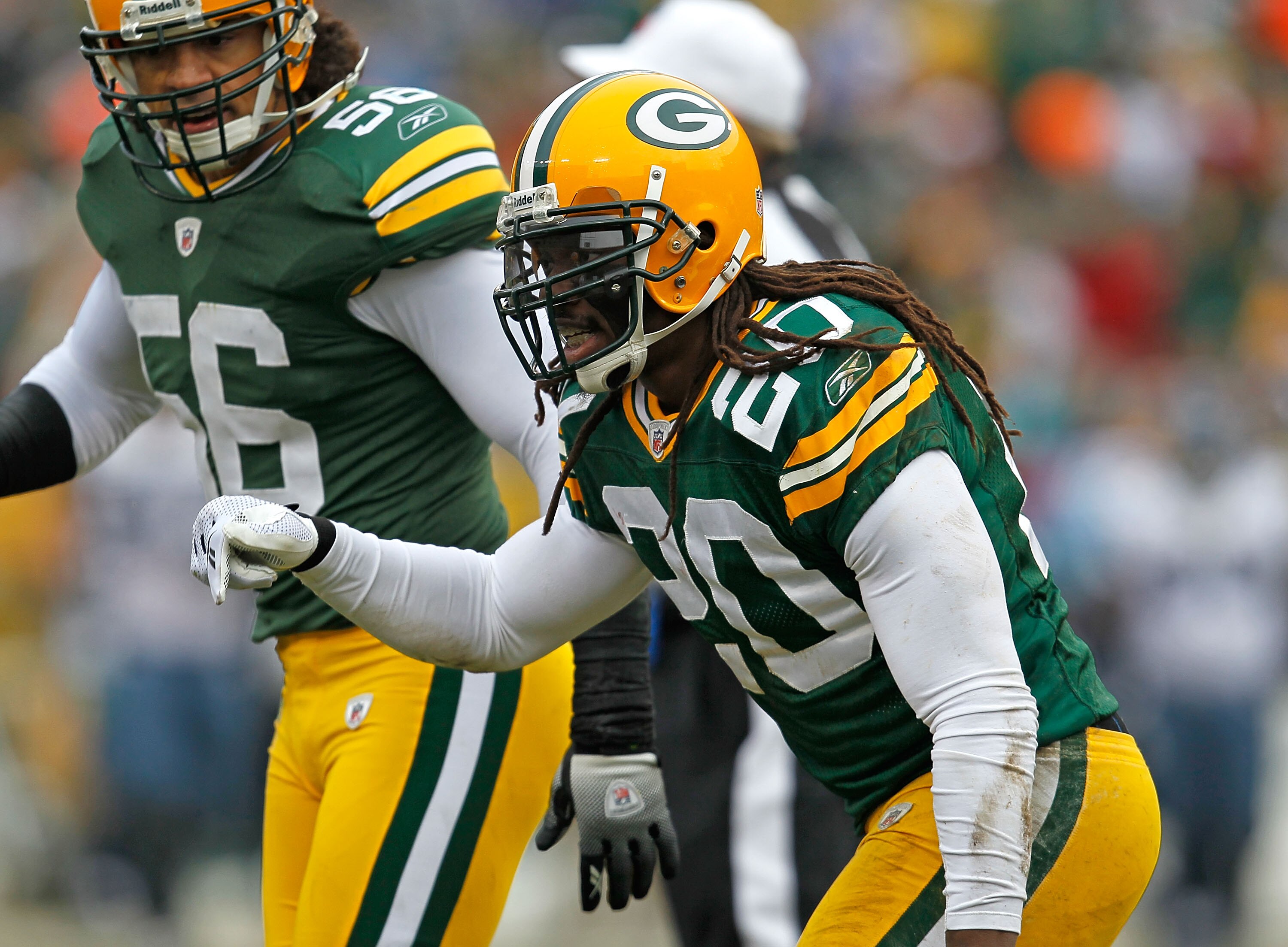 GREEN BAY, WI - DECEMBER 27: Atari Bigby #20 of the Green Bay Packers celebrates one of his two interceptions against the Seattle Seahawks at Lambeau Field on December 27, 2009 in Green Bay, Wisconsin. The Packers defeated the Seahawks 48-10. (Photo by Jo GREEN BAY, WI - DECEMBER 27: Atari Bigby #20 of the Green Bay Packers celebrates one of his two interceptions against the Seattle Seahawks at Lambeau Field on December 27, 2009 in Green Bay, Wisconsin. The Packers defeated the Seahawks 48-10. (Photo by Jo