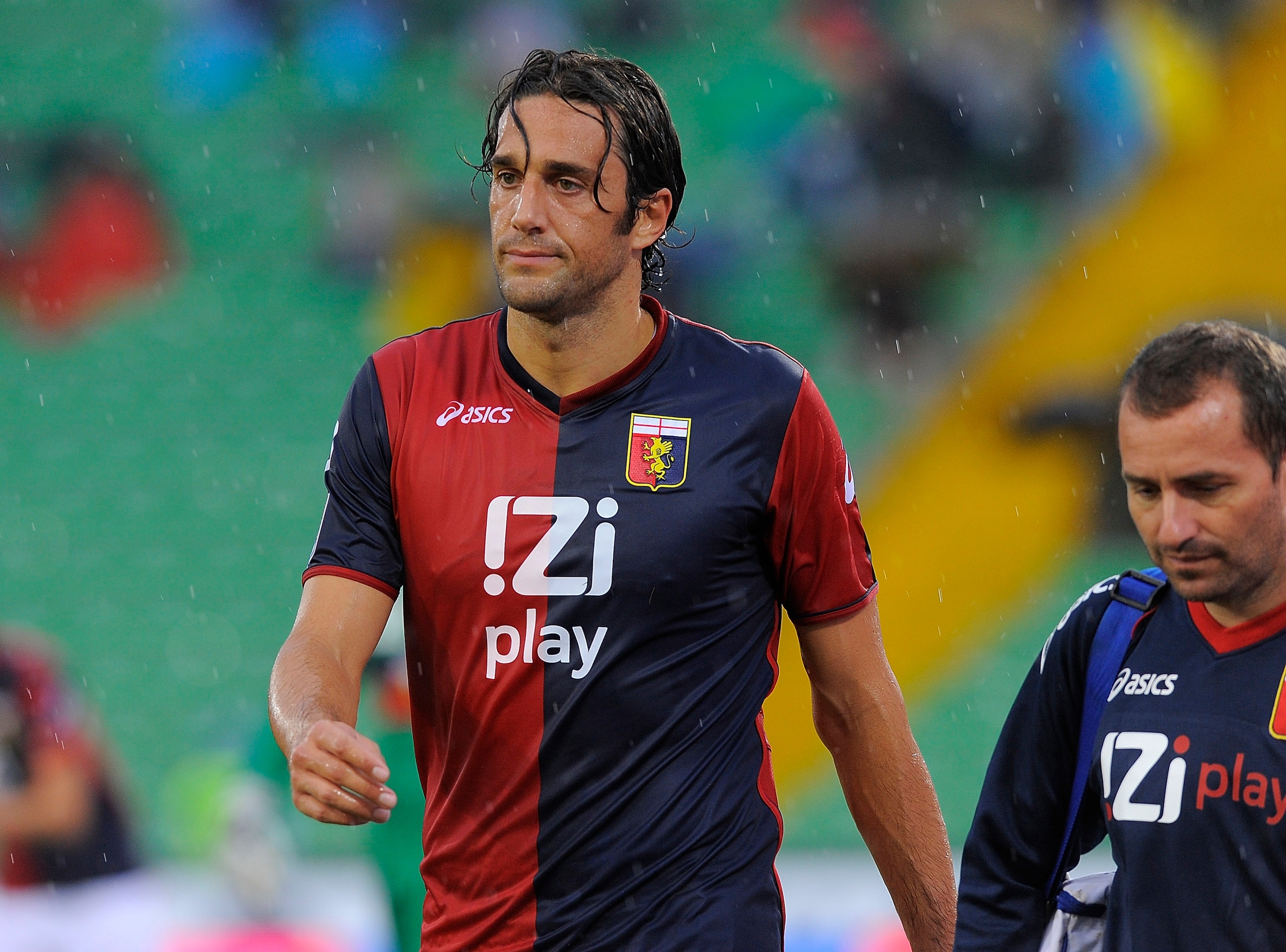 UDINE, ITALY - AUGUST 28:  Luca Toni of Genoa walks off with an injury                                                                                 during the Serie A match between Udinese and Genoa at Stadio Friuli on August 28, 2010 in Udine, Italy.