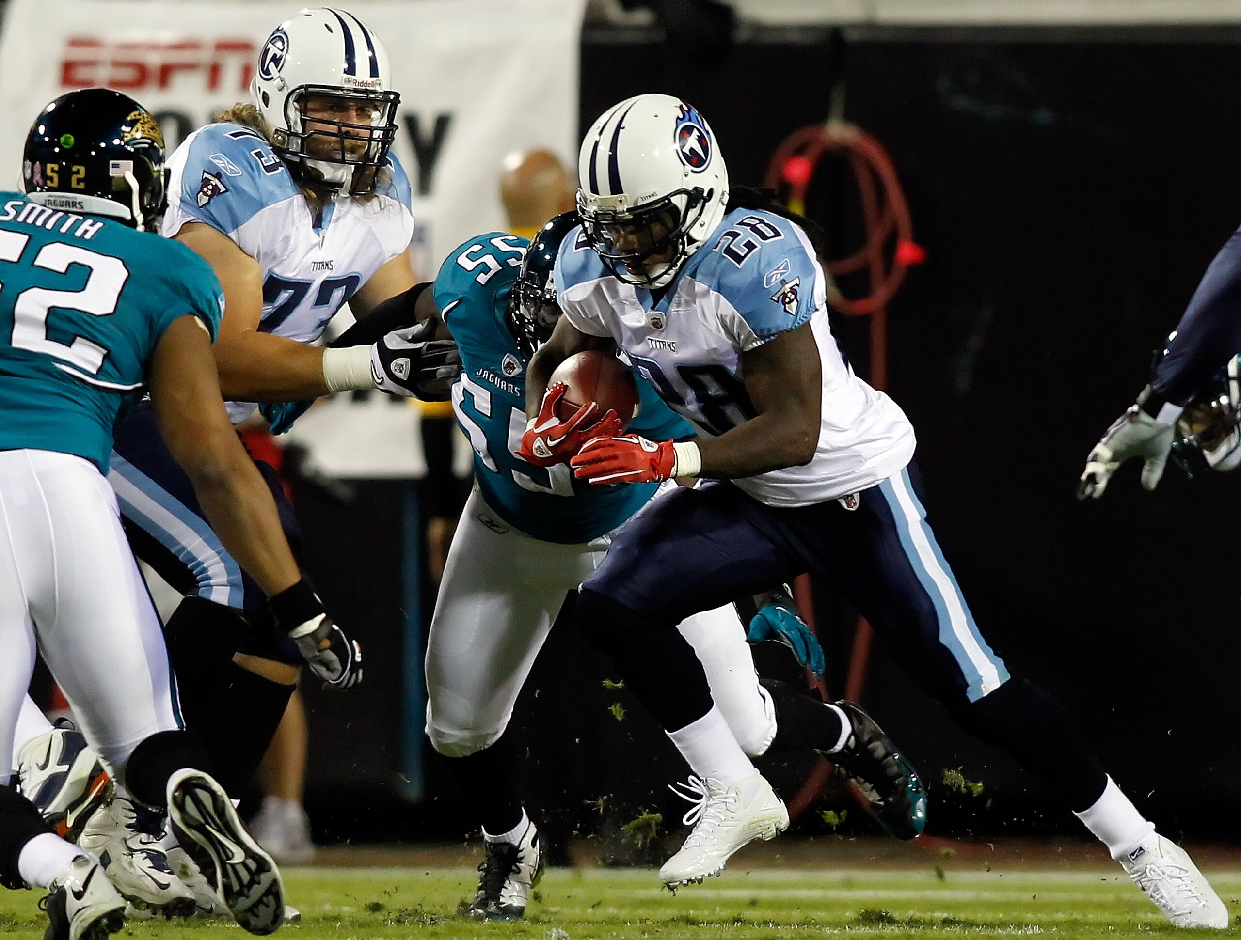 JACKSONVILLE, FL - OCTOBER 18:  Running back Chris Johnson #28 of the Tennessee Titans runs the ball against the Jacksonville Jaguars during the game at EverBank Field on October 18, 2010 in Jacksonville, Florida.  (Photo by J. Meric/Getty Images)