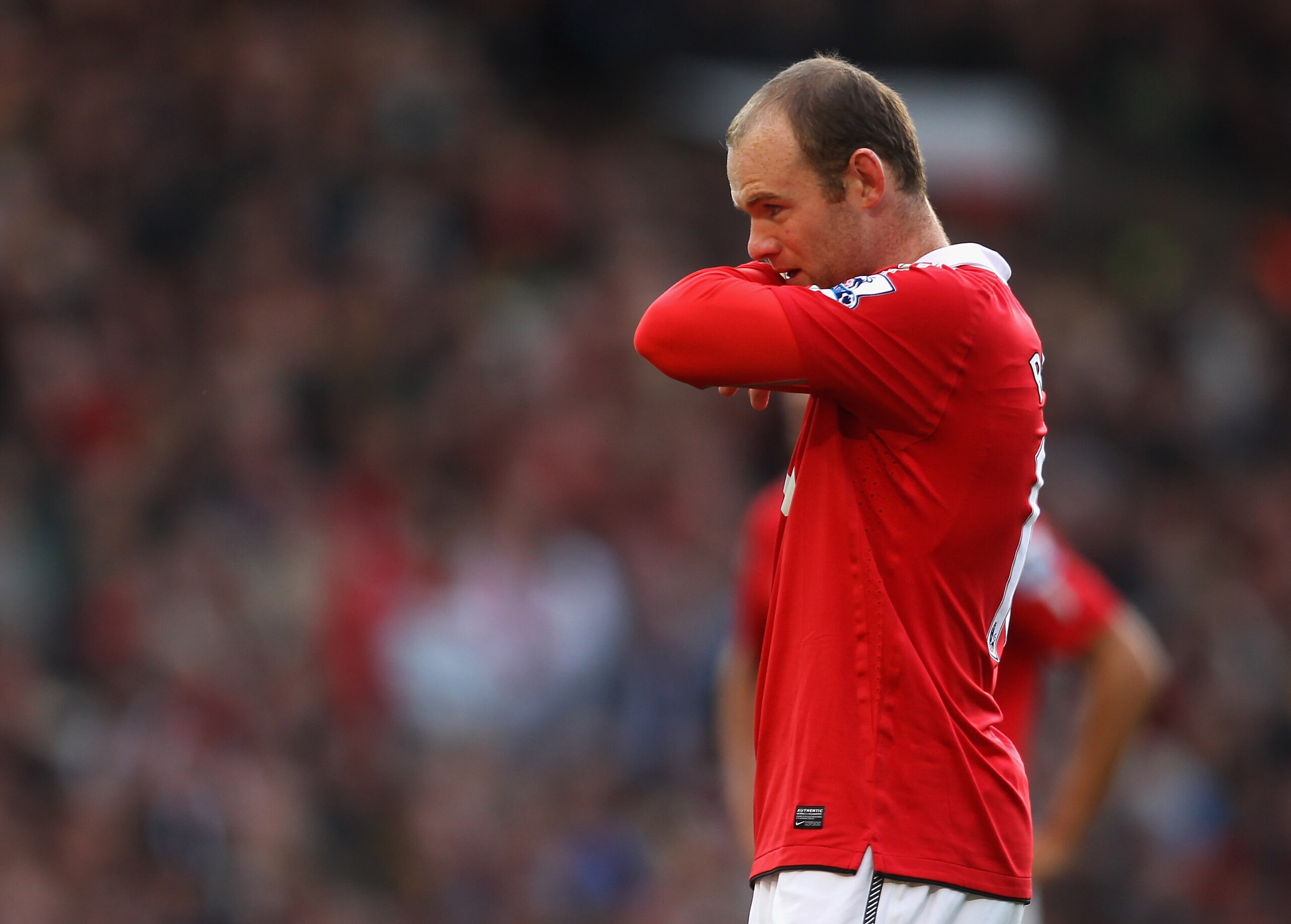 MANCHESTER, ENGLAND - OCTOBER 16:  Wayne Rooney of Manchester United looks dejected during the Barclays Premier League match between Manchester United and West Bromwich Albion at Old Trafford on October 16, 2010 in Manchester, England.  (Photo by Alex Liv