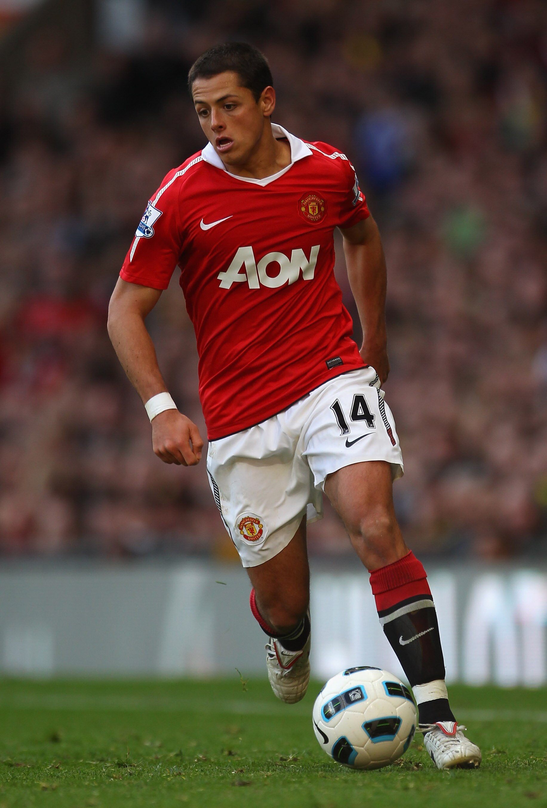 MANCHESTER, ENGLAND - OCTOBER 16:  Javier Hernandez of Manchester United runs with the ball during the Barclays Premier League match between Manchester United and West Bromwich Albion at Old Trafford on October 16, 2010 in Manchester, England.  (Photo by
