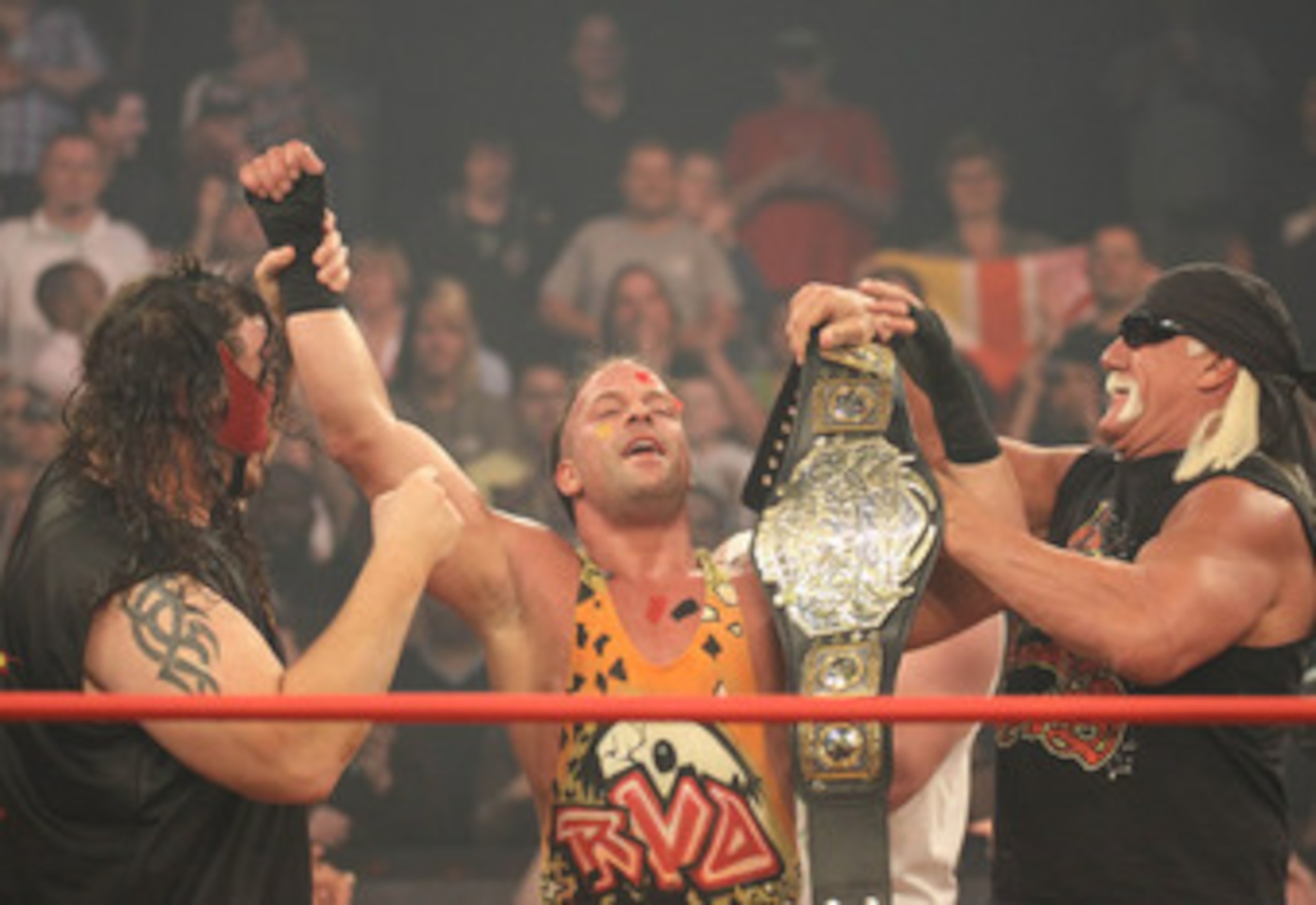 RVD celebrates after becoming the World Heavyweight Champion with "they" members; Hulk Hogan and Abyss