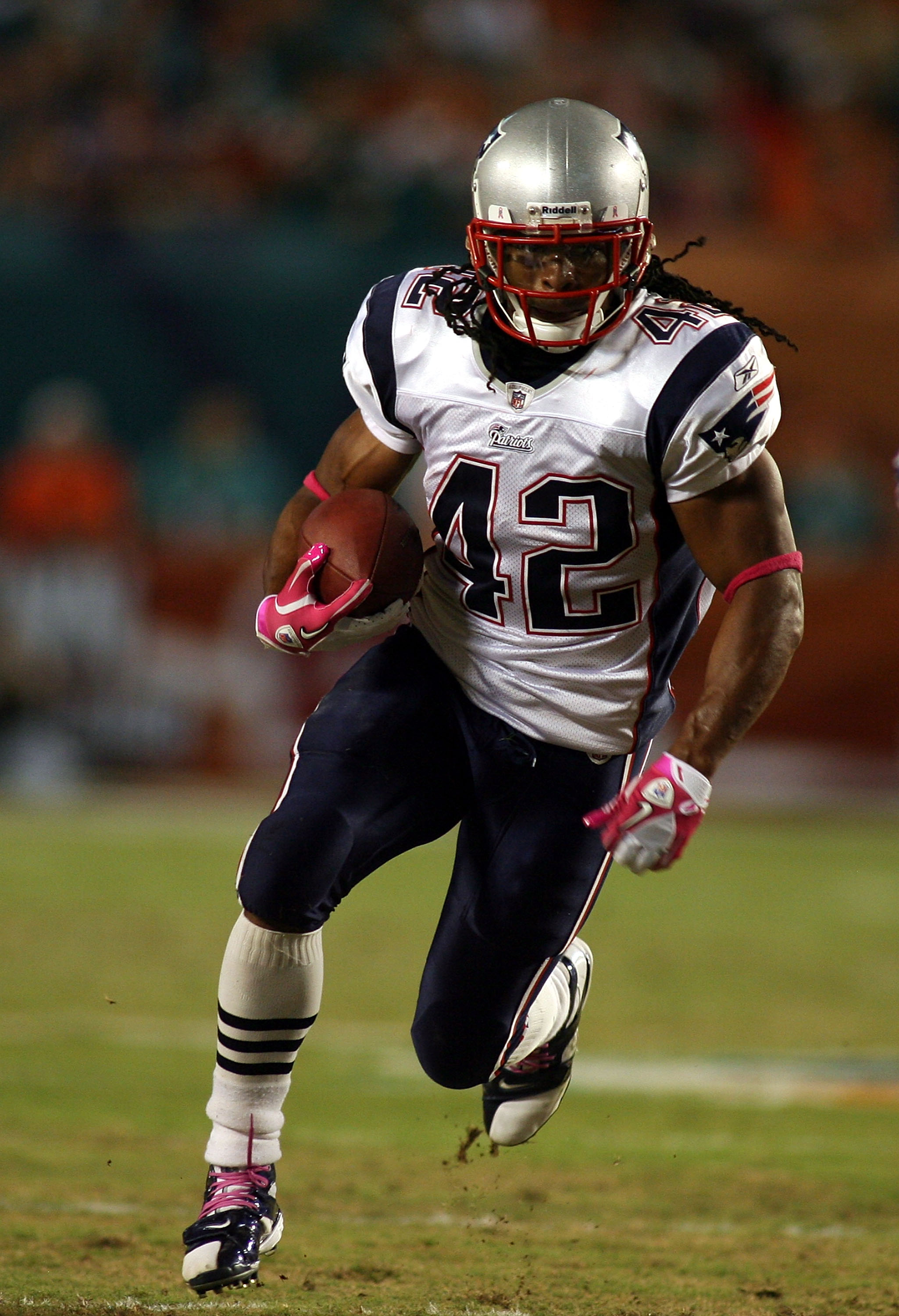 MIAMI - OCTOBER 04:  Running back Benjarvus Green-Ellis #42 of the New England Patriots runs  against the Miami Dolphins at Sun Life Stadium on October 4, 2010 in Miami, Florida.  (Photo by Marc Serota/Getty Images)