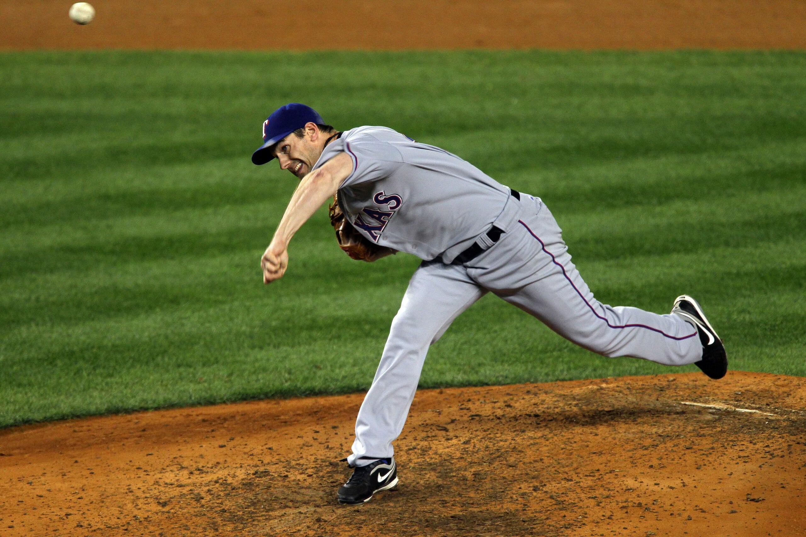 NEW YORK - OCTOBER 18: Cliff Lee #33 of the Texas Rangers throws a pitch against the New York Yankees in Game Three of the ALCS during the 2010 MLB Playoffs at Yankee Stadium on October 18, 2010 in New York, New York. (Photo by Jim McIsaac/Getty Images) NEW YORK - OCTOBER 18: Cliff Lee #33 of the Texas Rangers throws a pitch against the New York Yankees in Game Three of the ALCS during the 2010 MLB Playoffs at Yankee Stadium on October 18, 2010 in New York, New York. (Photo by Jim McIsaac/Getty Images)