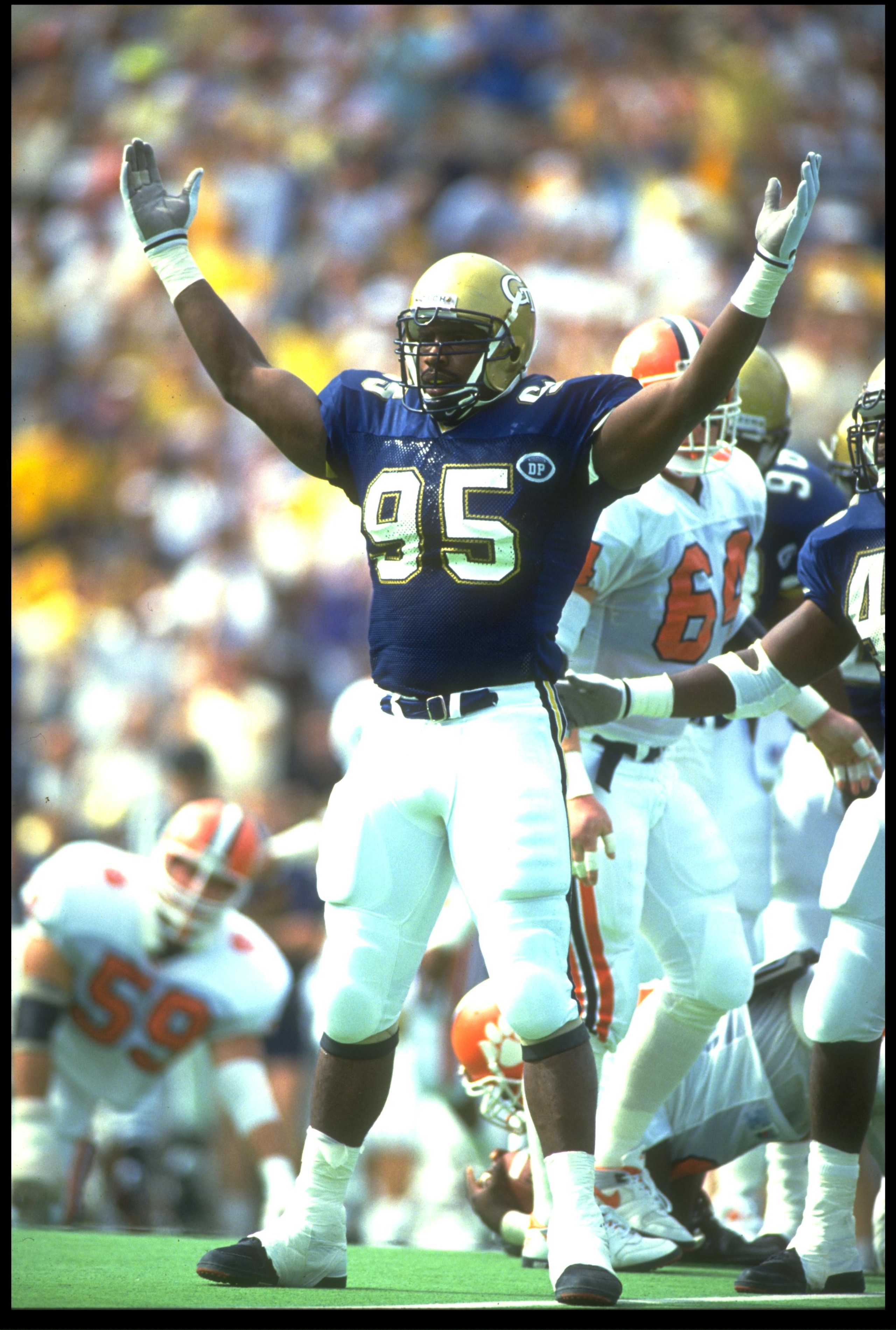 13 Oct 1990: GEORGIA TECH DEFENSIVE LINEMAN MARCO COLEMAN CELEBRATES DURING THE YELLOW JACKETS 21-19 WIN OVER THE CLEMSON TIGERS AT THE GRANT FIELD IN ATLANTA, GEORGIA