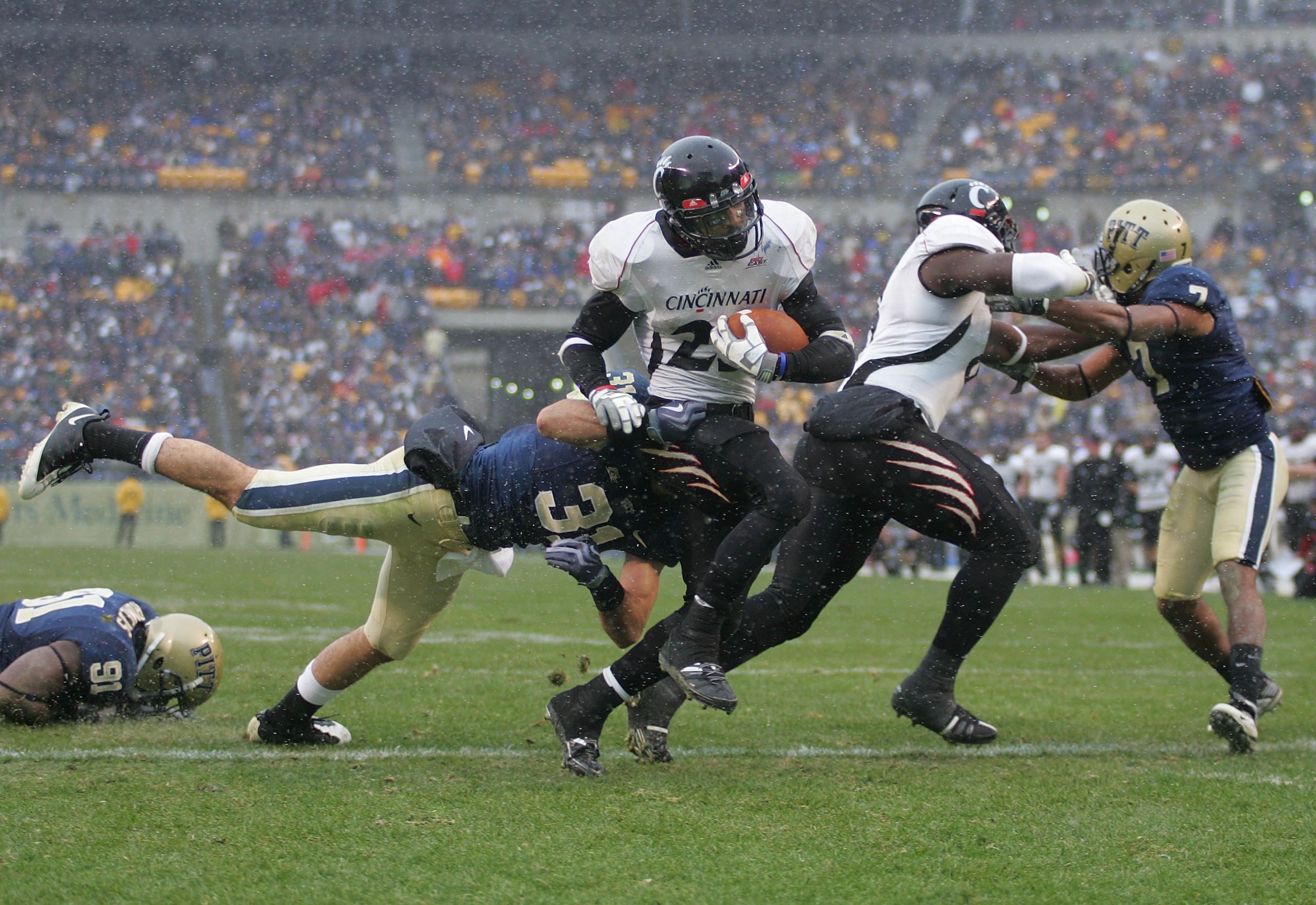 PITTSBURGH - DECEMBER 05:  Isaiah Pead #23 of the Cincinnati Bearcats scores a touchdown in the fourth quarter against the University of Pittsburgh Panthers on December 5, 2009 at Heinz Field in Pittsburgh, Pennsylvania.  (Photo by Jared Wickerham/Getty I