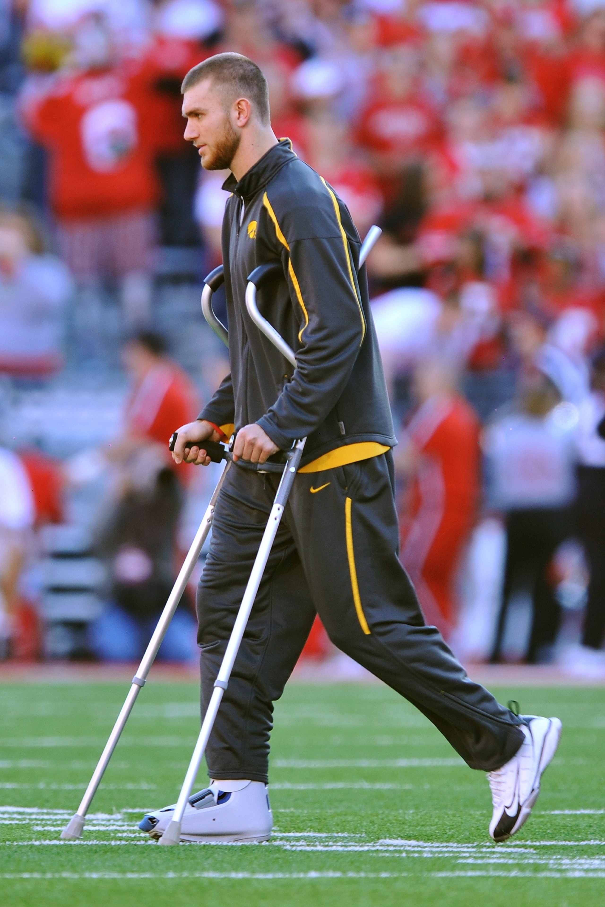COLUMBUS, OH - NOVEMBER 14:  Injured quarterback Ricky Stanzi #12 of the Iowa Hawkeyes walks across the field before a game against the Ohio State Buckeyes at Ohio Stadium on November 14, 2009 in Columbus, Ohio.  (Photo by Jamie Sabau/Getty Images)