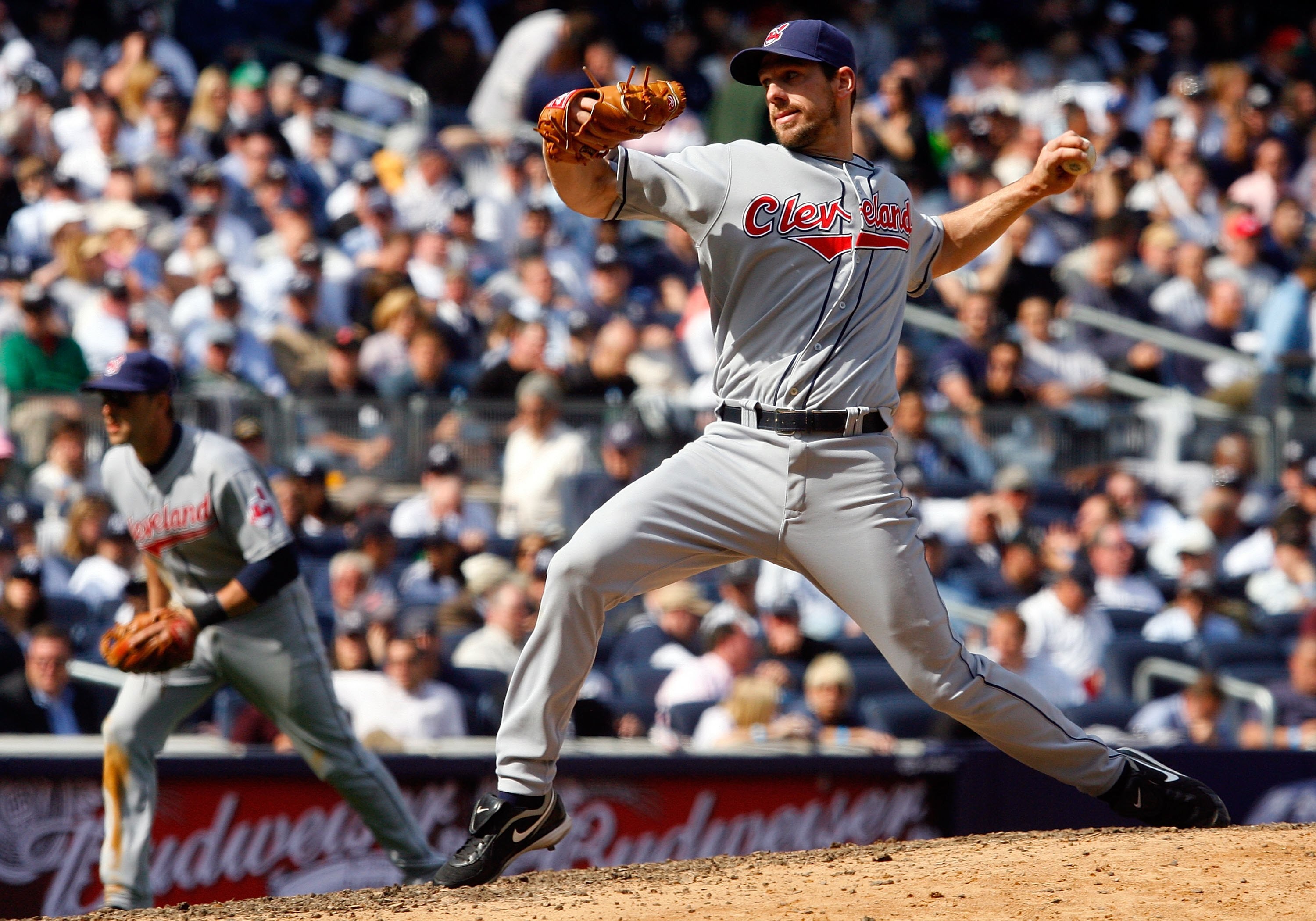 NEW YORK - APRIL 16:  Cliff Lee #31 of the Cleveland Indians pitches against the New York Yankees during opening day at the new Yankee Stadium on April 16, 2009 in the Bronx borough of New York City. This is the first regular season MLB game being played