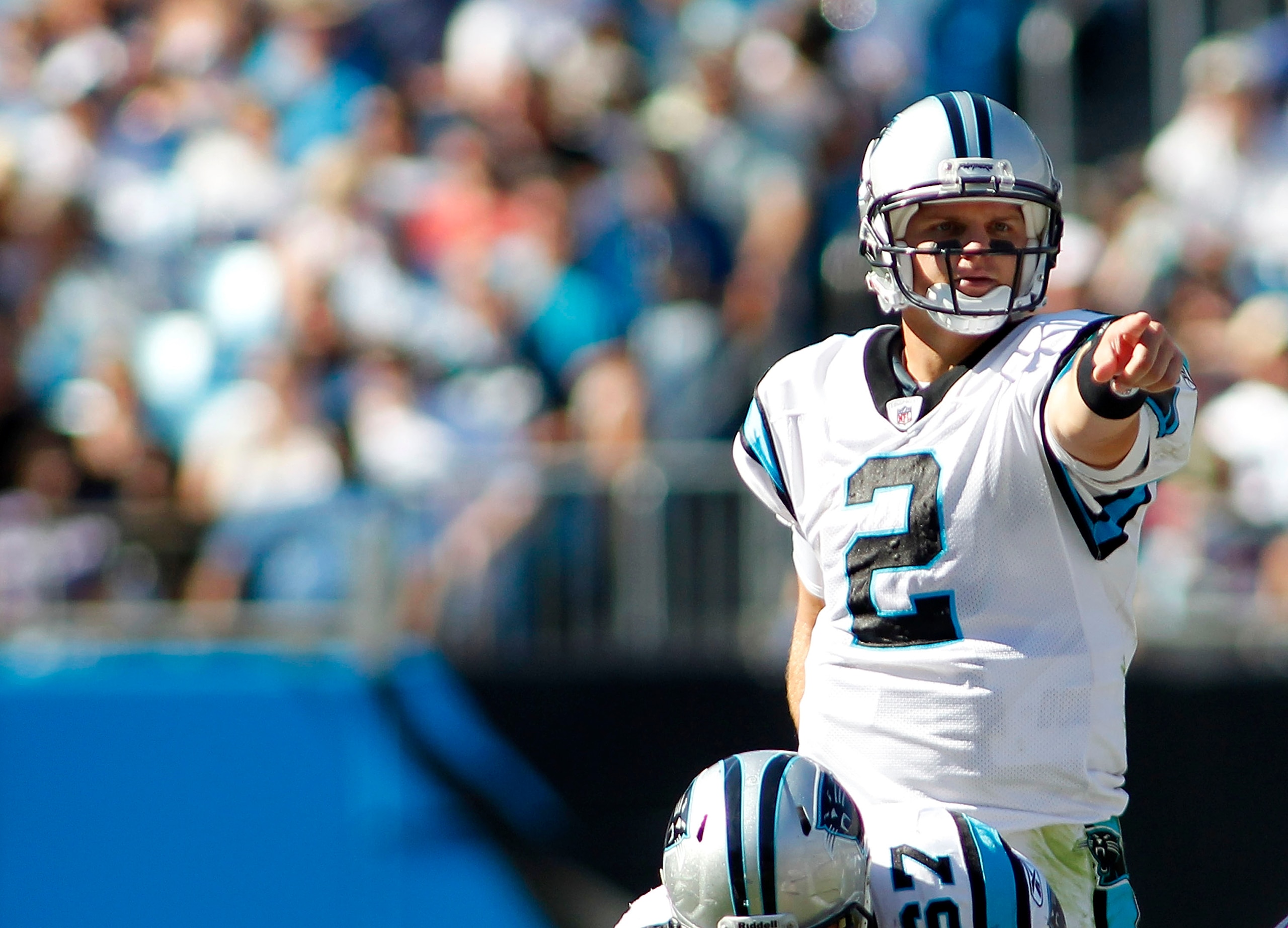 CHARLOTTE, NC - OCTOBER 10: Quarterback Jimmy Clausen #2 of the Carolina Panthers signals against the Chicago Bears at Bank of America Stadium on October 10, 2010 in Charlotte, North Carolina.  (Photo by Geoff Burke/Getty Images)