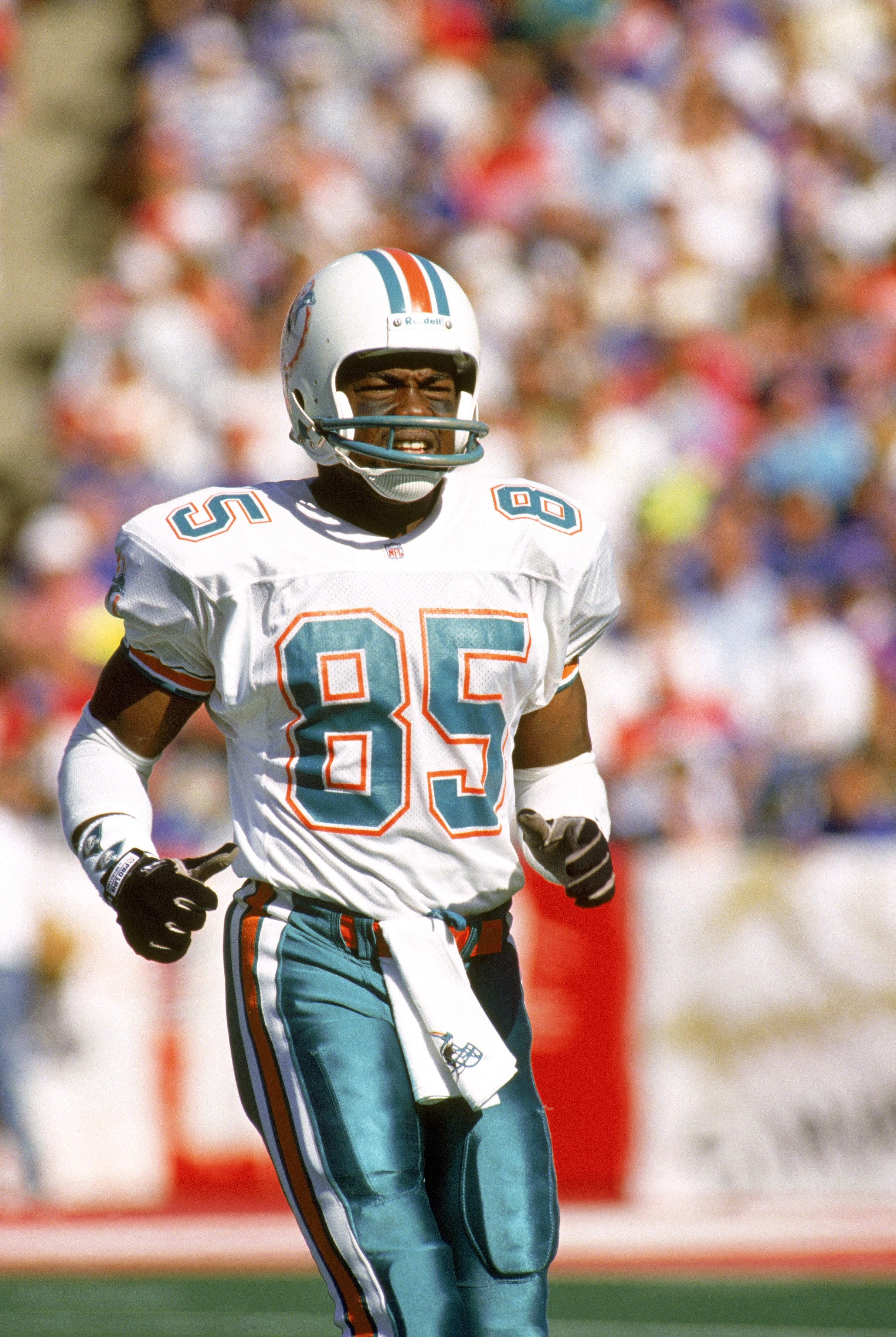 ORCHARD PARK, NY - OCTOBER 4:  Wide receiver Mark Duper #85 of the Miami Dolphins runs on the field during a game against the Buffalo Bills at Ralph Wilson Stadium on October 4, 1992 in Orchard Park, New York.  The Dolphins won 37-10.  (Photo by Rick Stew