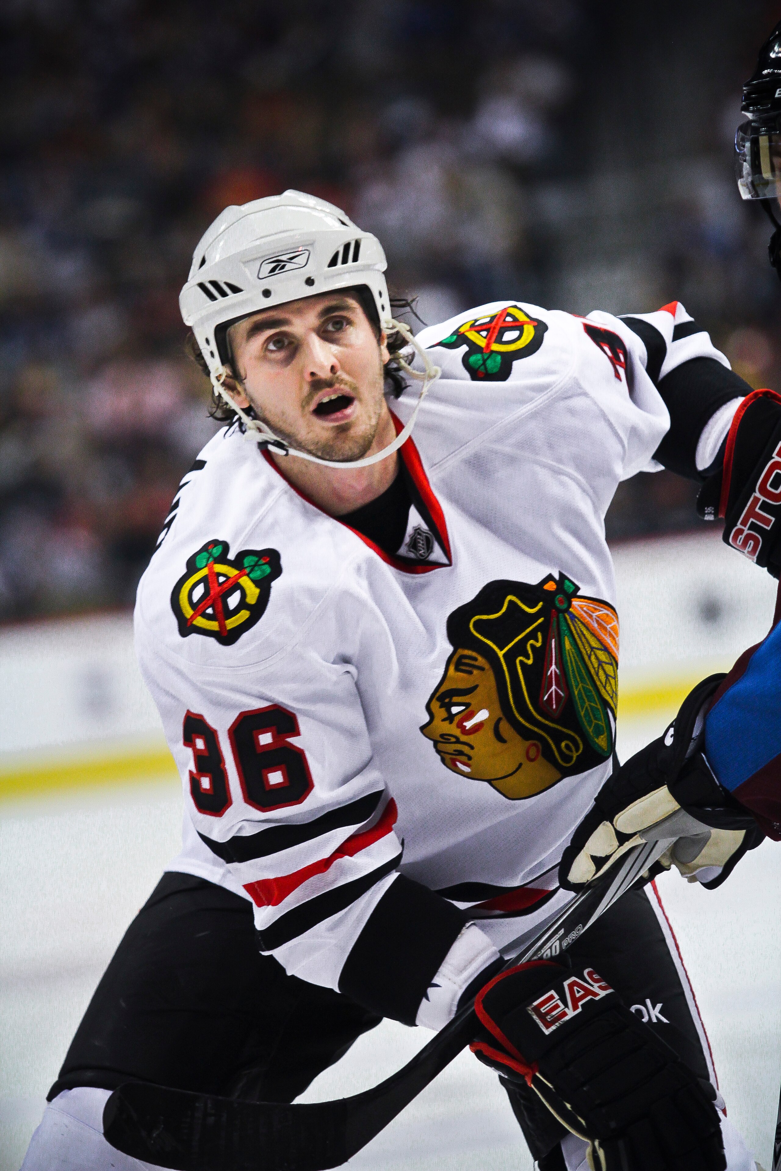 DENVER, CO - OCTOBER 7: Dave Bolland #36 of the Chicago Blackhawks looks for the puck after a faceoff against the Colorado Avalanche during both team's season openers at the Pepsi Center on October 7, 2010 in Denver, Colorado. (Photo by Marc Piscotty/Gett