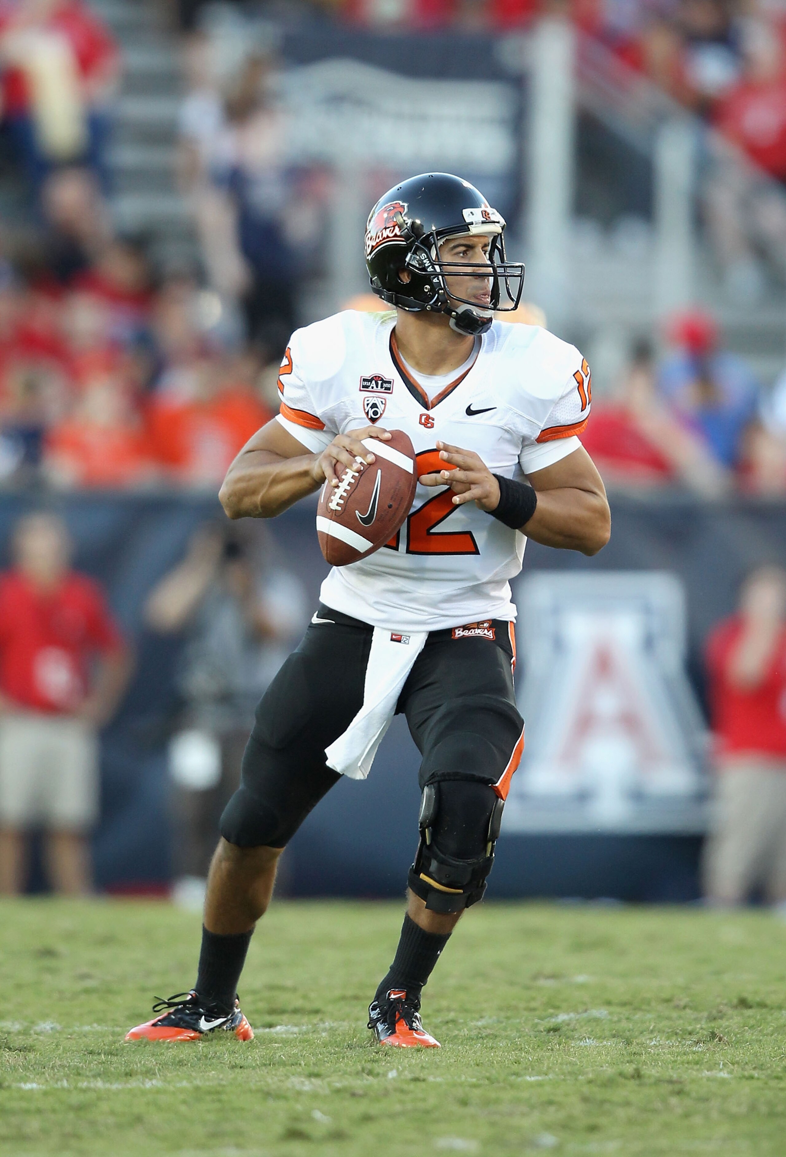 TUCSON, AZ - OCTOBER 09:  Quarterback Ryan Katz #12 of the Oregon State Beavers drops back to pass during the college football game against the Arizona Wildcats at Arizona Stadium on October 9, 2010 in Tucson, Arizona.  The Beavers defeated the Wildcats 2