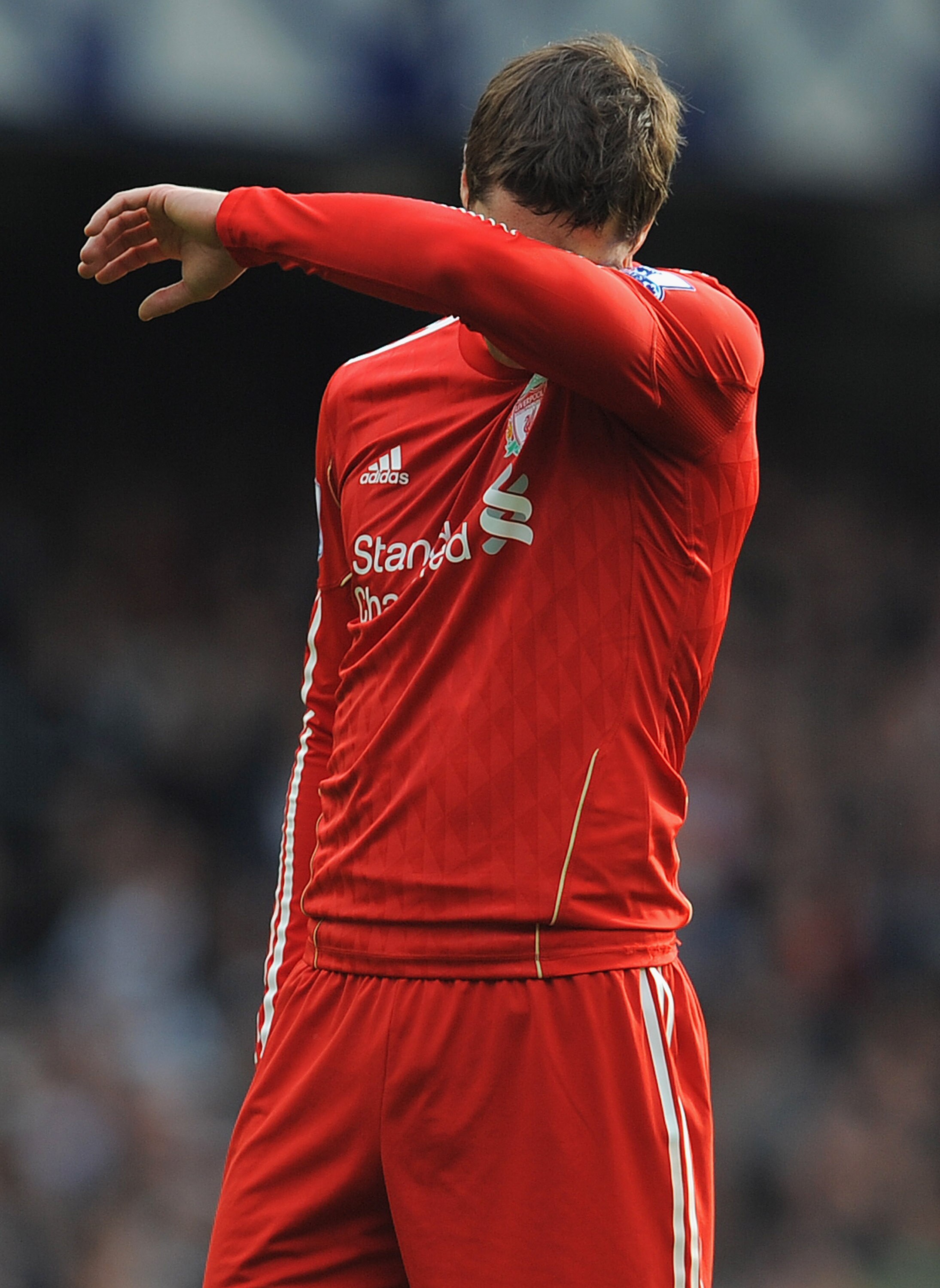 LIVERPOOL, ENGLAND - OCTOBER 17: Fernando Torres of Liverpool looks dejected during the Barclays Premier League match between Everton and Liverpool at Goodison Park on October 17, 2010 in Liverpool, England.  (Photo by Michael Regan/Getty Images)