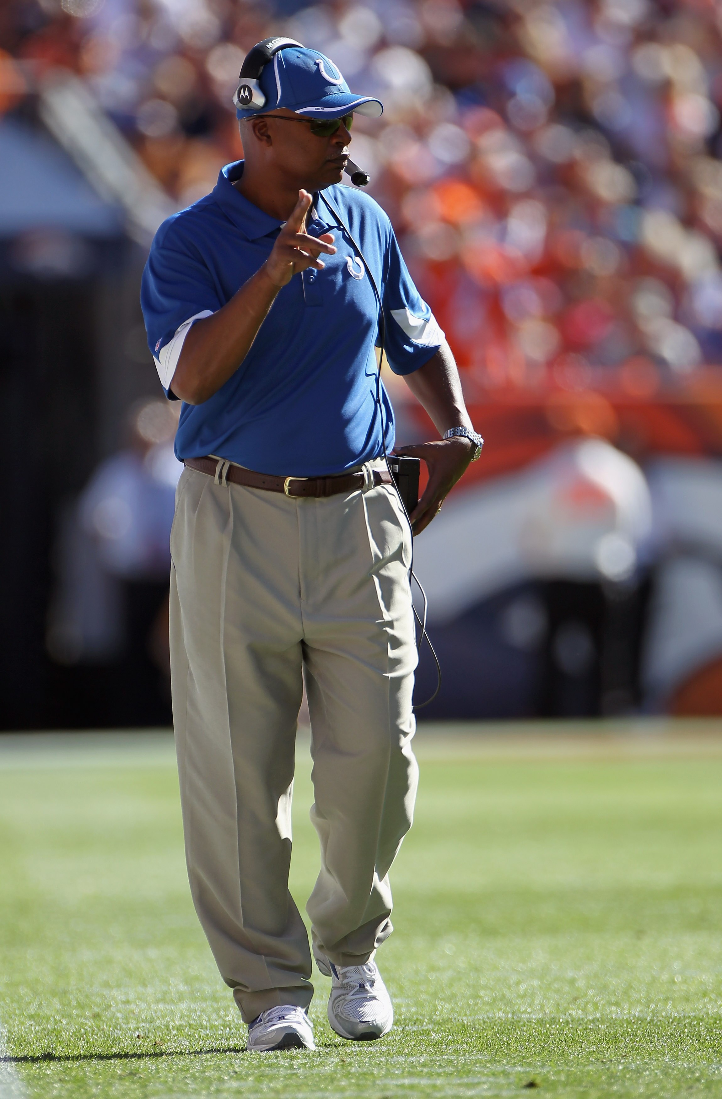 DENVER - SEPTEMBER 26:  Head coach Jim Caldwell of the Indianapolis Colts leads his team against the Denver Broncos at INVESCO Field at Mile High on September 26, 2010 in Denver, Colorado.  (Photo by Doug Pensinger/Getty Images)