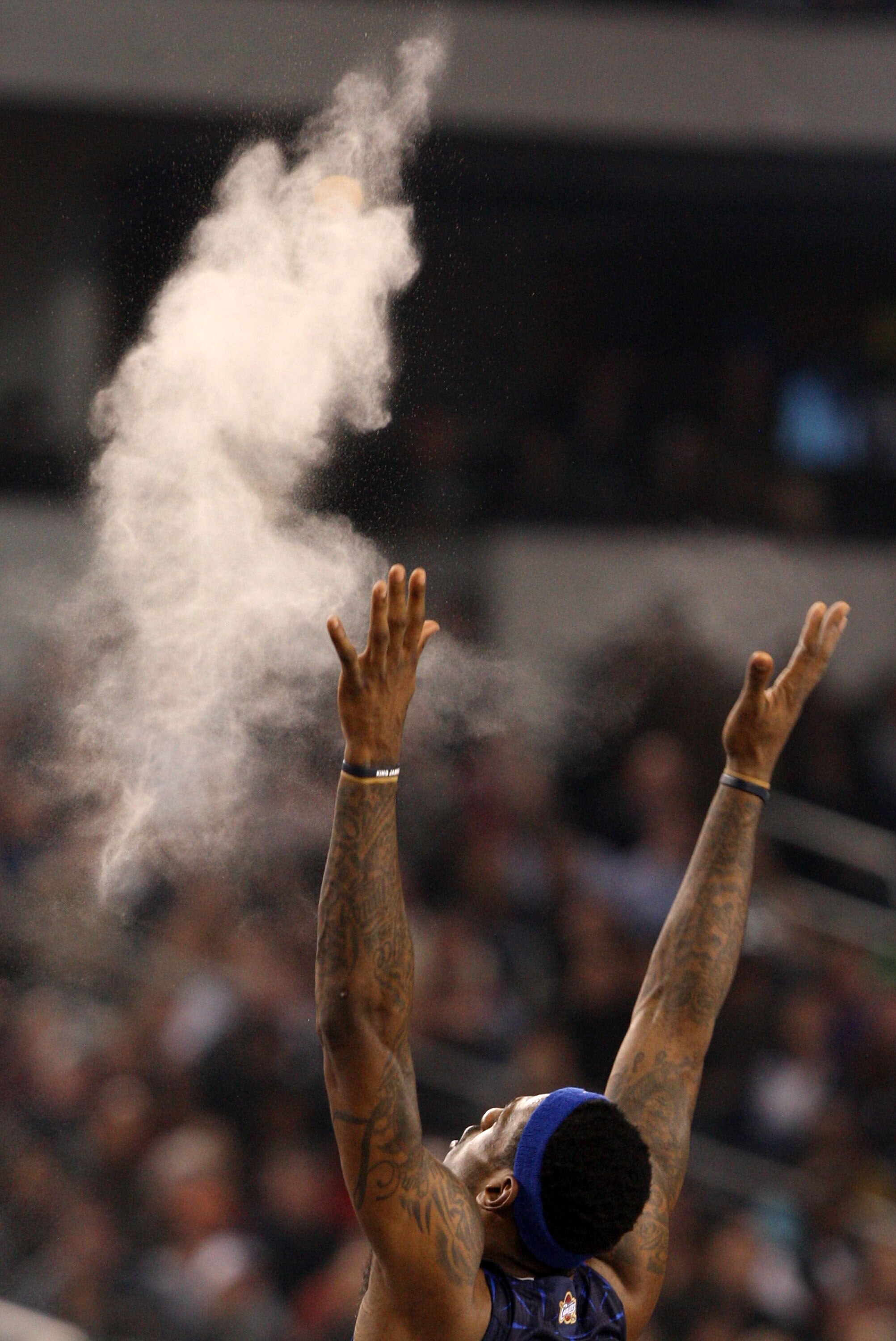 ARLINGTON, TX - FEBRUARY 14:  LeBron James #23 of the Eastern Conference throws chalk up in the air  before playing against the Western Conference in the NBA All-Star Game, part of 2010 NBA All-Star Weekend at Cowboys Stadium on February 14, 2010 in Arlin