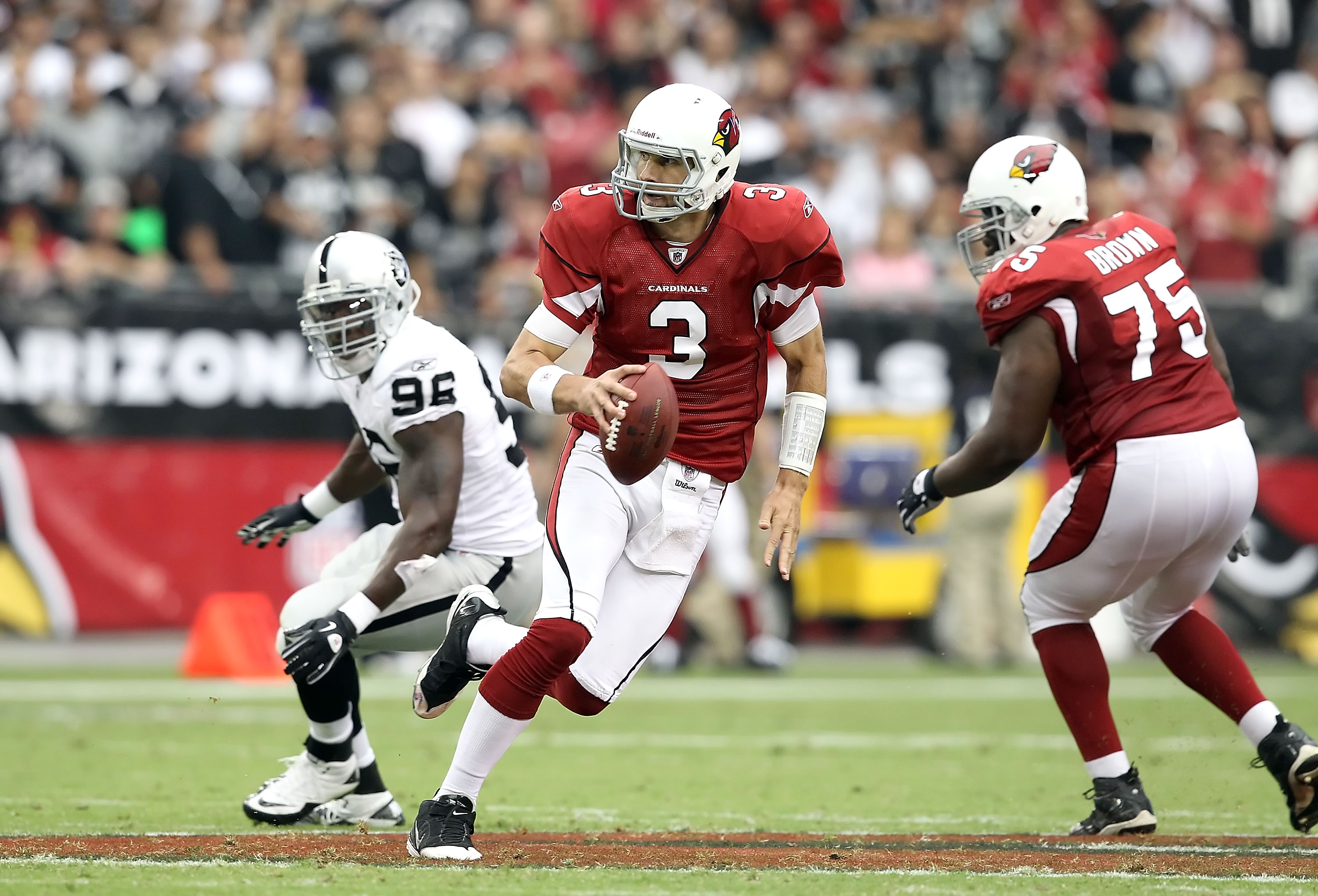 GLENDALE, AZ - SEPTEMBER 26: Quarterback Derek Anderson #3 of the Arizona Cardinals scrambles with the football during the NFL game against the Oakland Raiders at the University of Phoenix Stadium on September 26, 2010 in Glendale, Arizona. The Cardinal GLENDALE, AZ - SEPTEMBER 26: Quarterback Derek Anderson #3 of the Arizona Cardinals scrambles with the football during the NFL game against the Oakland Raiders at the University of Phoenix Stadium on September 26, 2010 in Glendale, Arizona. The Cardinal
