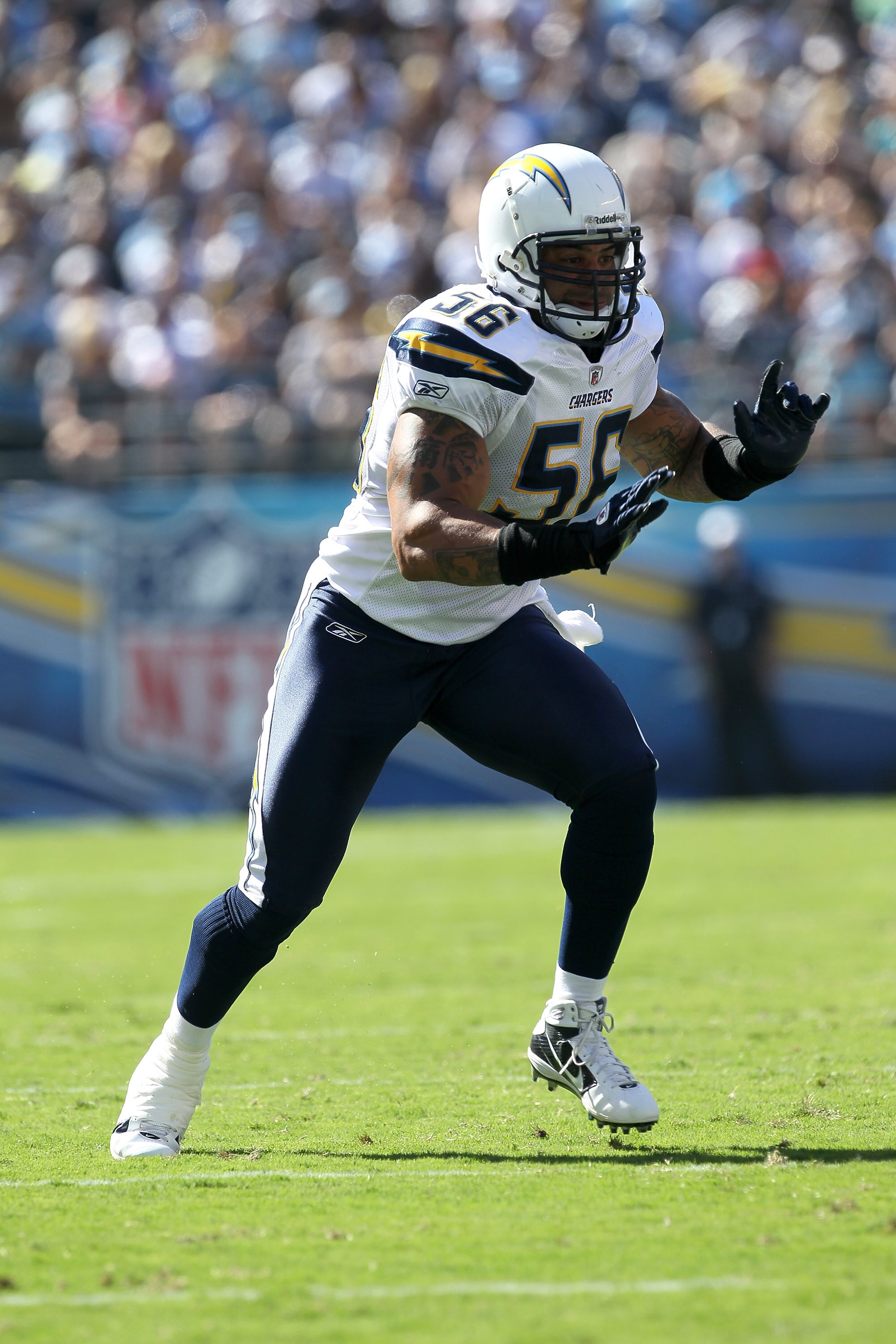 SAN DIEGO - SEPTEMBER 19:  Linebacker Shawne Merriman #56 of the San Diego Chargers comes off the line of scrimmage against the Jacksonville Jaguars at Qualcomm Stadium on September 19, 2010 in San Diego, California. The Chargers won 38-13.  (Photo by Ste