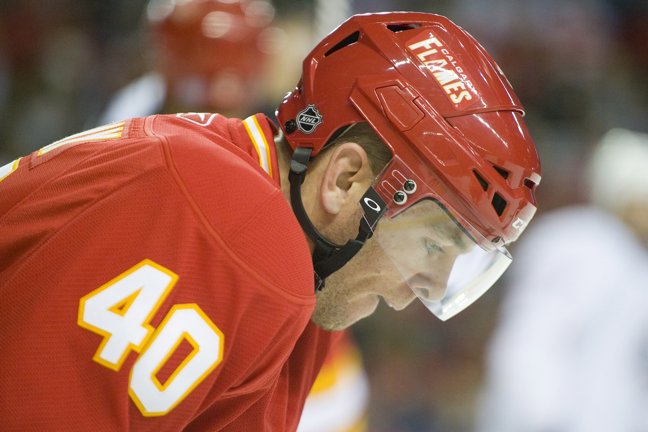 EDMONTON, CANADA - OCTOBER 16:  Calgary Flames left wing Alex Tanguay #40 takes a breather during a stoppage against the Edmonton Oilers at the Scotiabank Saddledome  on October 16, 2010 in Calgary, Alberta, Canada.  The Flames beat the Oilers 5-3.  (Phot