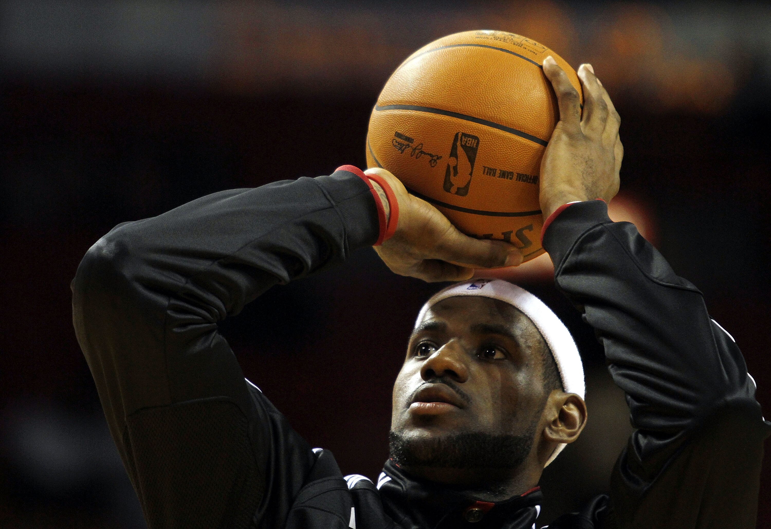 MIAMI - OCTOBER 18:  Forward LeBron James #6 of the Miami Heat prepares to face the Charlotte Bobcats on October 18, 2010 at American Airlines Arena in Miami, Florida. NOTE TO USER: User expressly acknowledges and agrees that, by downloading and/or using