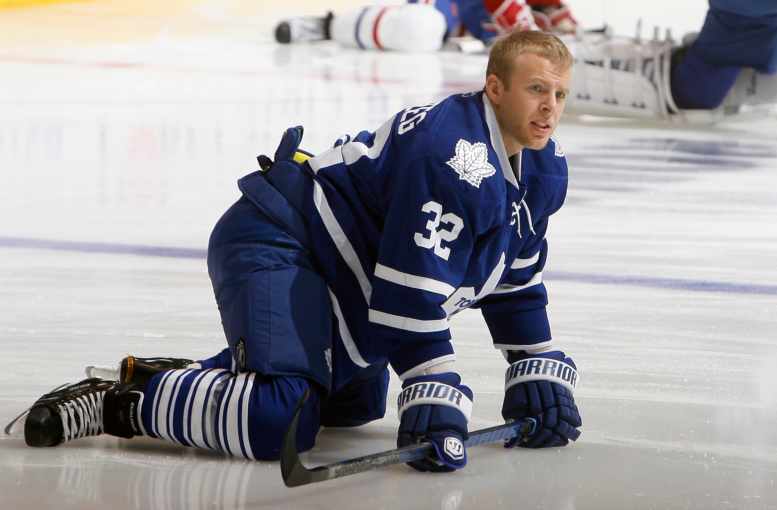 TORONTO, CANADA - OCTOBER 07: Kris Versteeg #32 of the Toronto Maple Leafs stretches during warmup before a regular season NHL game against the Montreal Canadiens at the Air Canada Centre October 7, 2010 in Toronto, Ontario, Canada. (Photo by Abelimages/G