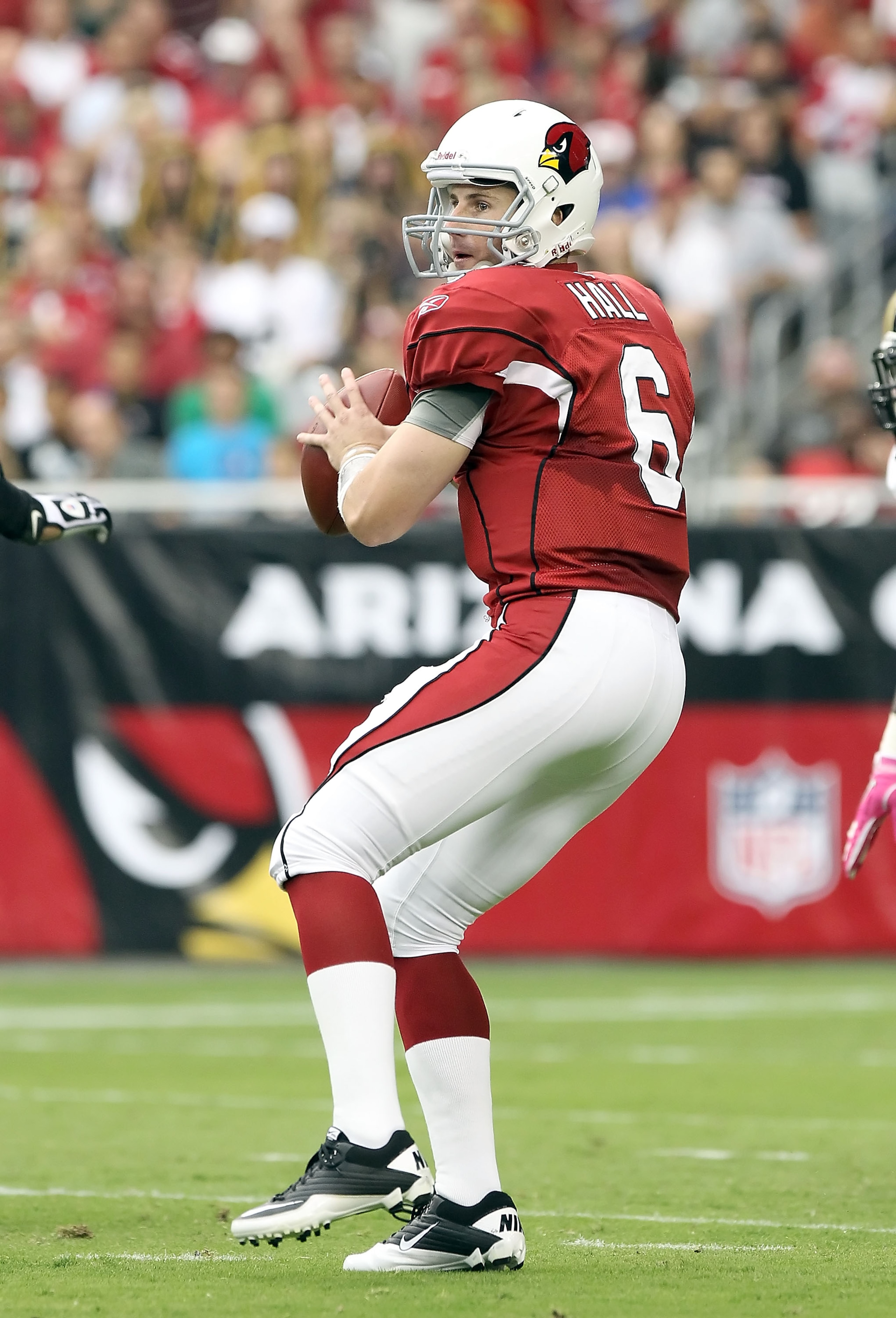 GLENDALE, AZ - OCTOBER 10:  Quarterback Max Hall #6 of the Arizona Cardinals drops back to pass during the NFL game against the New Orleans Saints at the University of Phoenix Stadium on October 10, 2010 in Glendale, Arizona. The Cardinals defeated the Sa