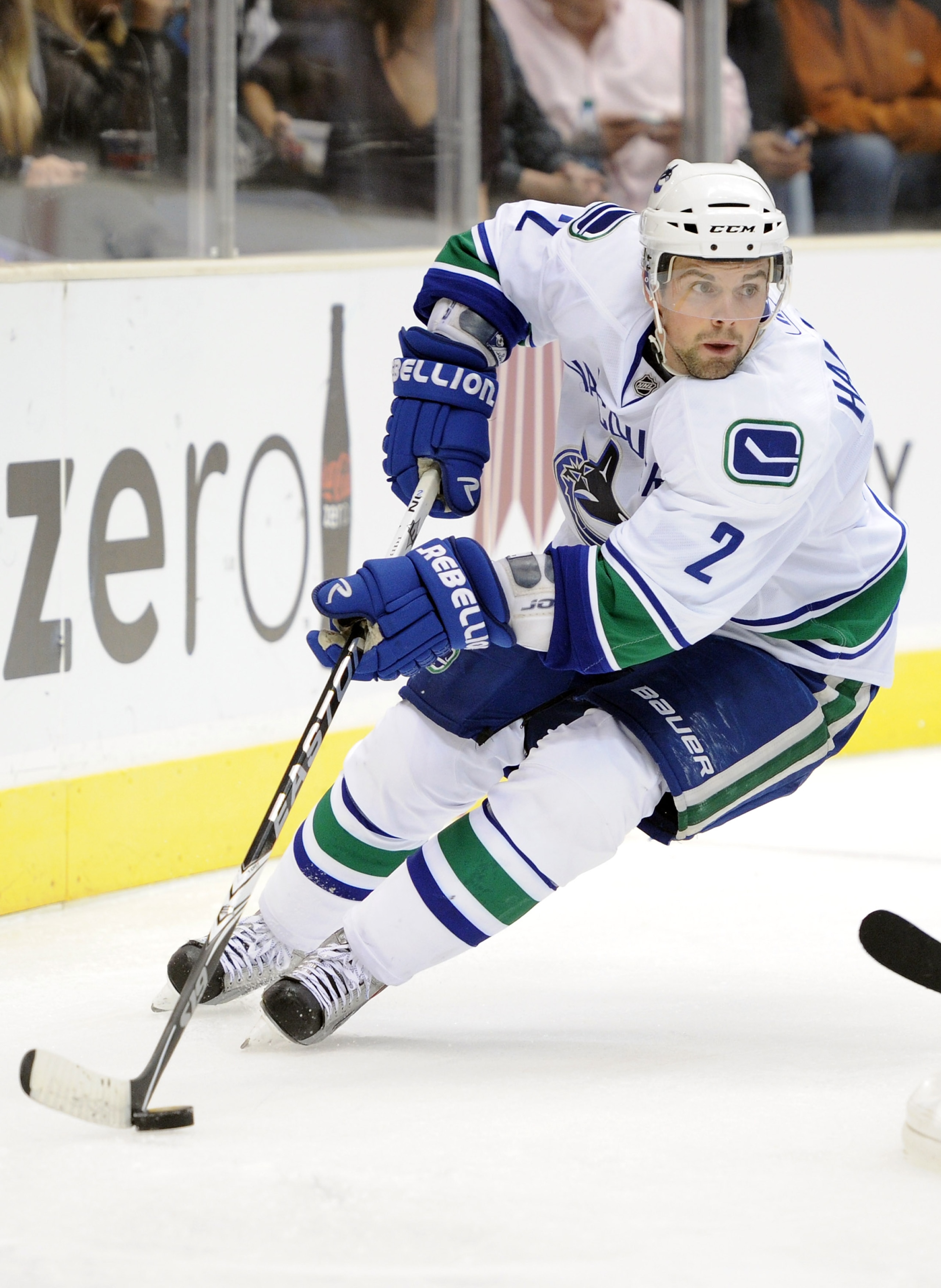 LOS ANGELES, CA - OCTOBER 15:  Dan Hamhuis #2 of the Vancouver Canucks looks to pass the puck against the Los Angeles Kings at the Staples Center on October 15, 2010 in Los Angeles, California.  (Photo by Harry How/Getty Images)