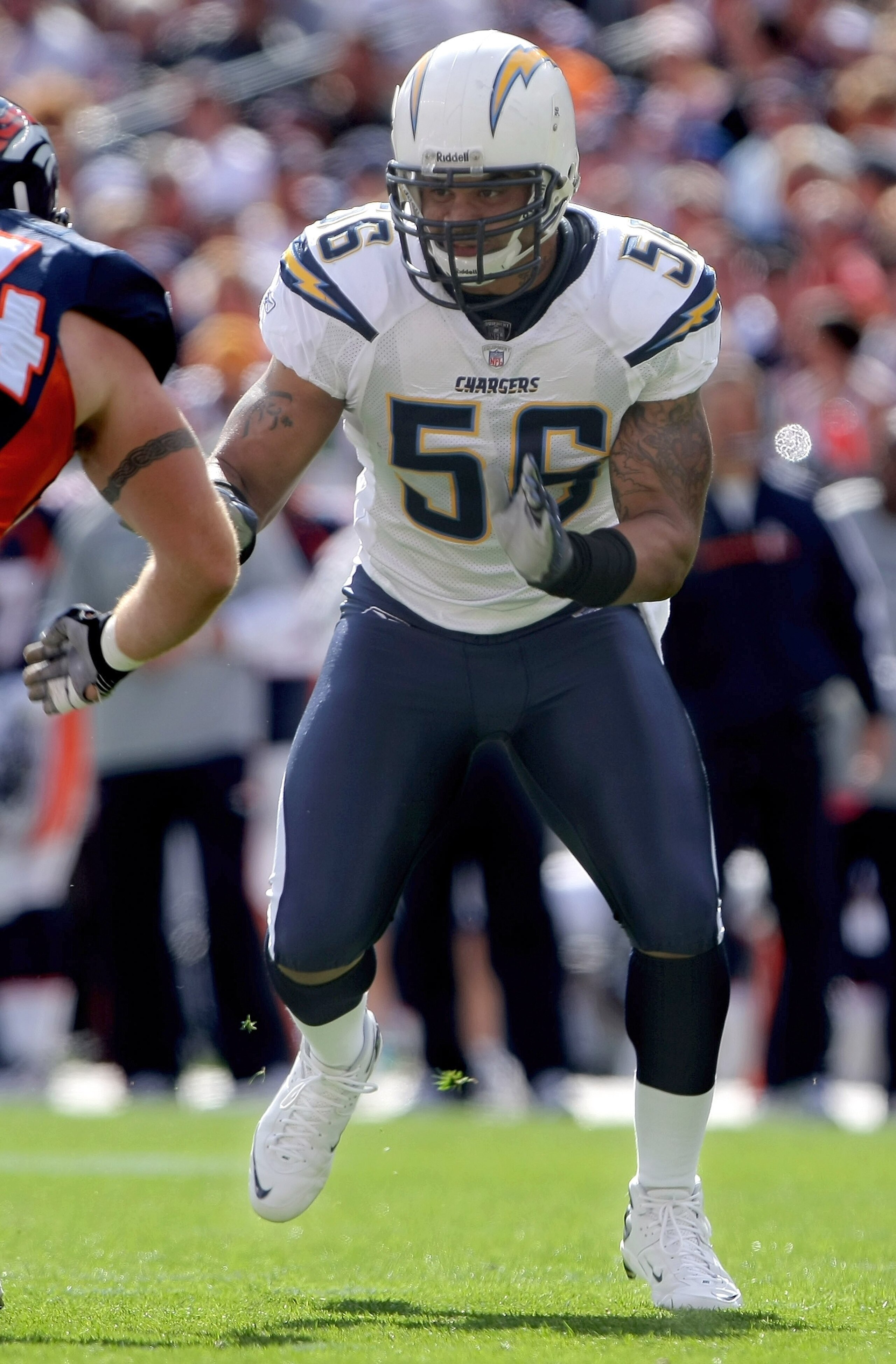 DENVER - OCTOBER 07:  Shawne Merriman #56 of the San Diego Chargers leaves the line of scrimmage against the Denver Broncos at Invesco Field at Mile High on October 7, 2007 in Denver, Colorado. The Chargers defeated the Broncos 41-3.  (Photo by Doug Pensi