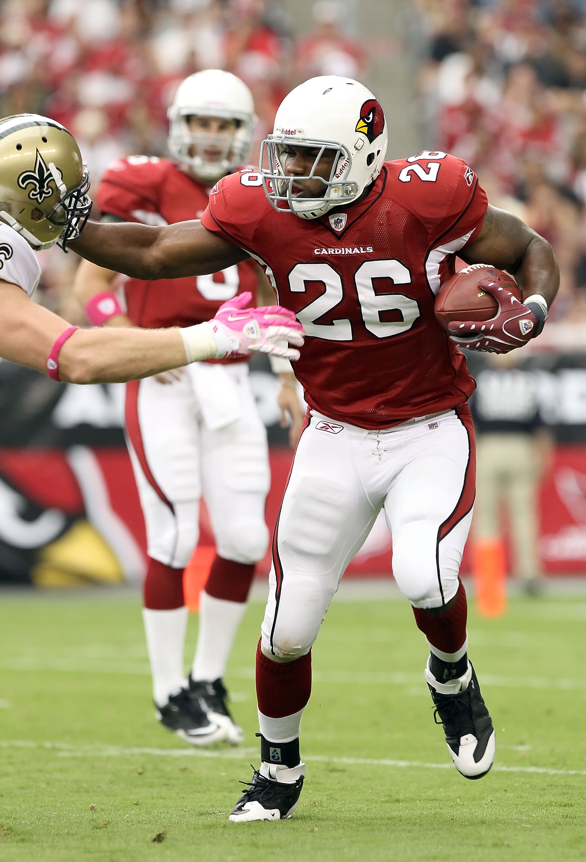 GLENDALE, AZ - OCTOBER 10:  Runningback Beanie Wells #26 of the Arizona Cardinals runs with the football during the NFL game against the New Orleans Saints at the University of Phoenix Stadium on October 10, 2010 in Glendale, Arizona.  (Photo by Christian