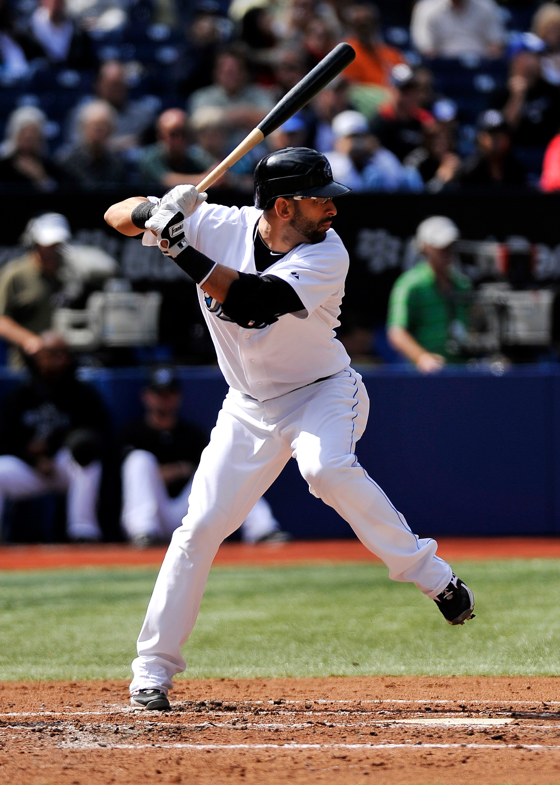 TORONTO - SEPTEMBER 23:   Jose Bautista #19 of the Toronto Blue Jays bats during the game against the Seattle Mariners on September 23, 2010 at Rogers Centre in Toronto, Ontario, Canada. The Blue Jays defeated the Mariners 1-0. (Photo by Brad White/Getty