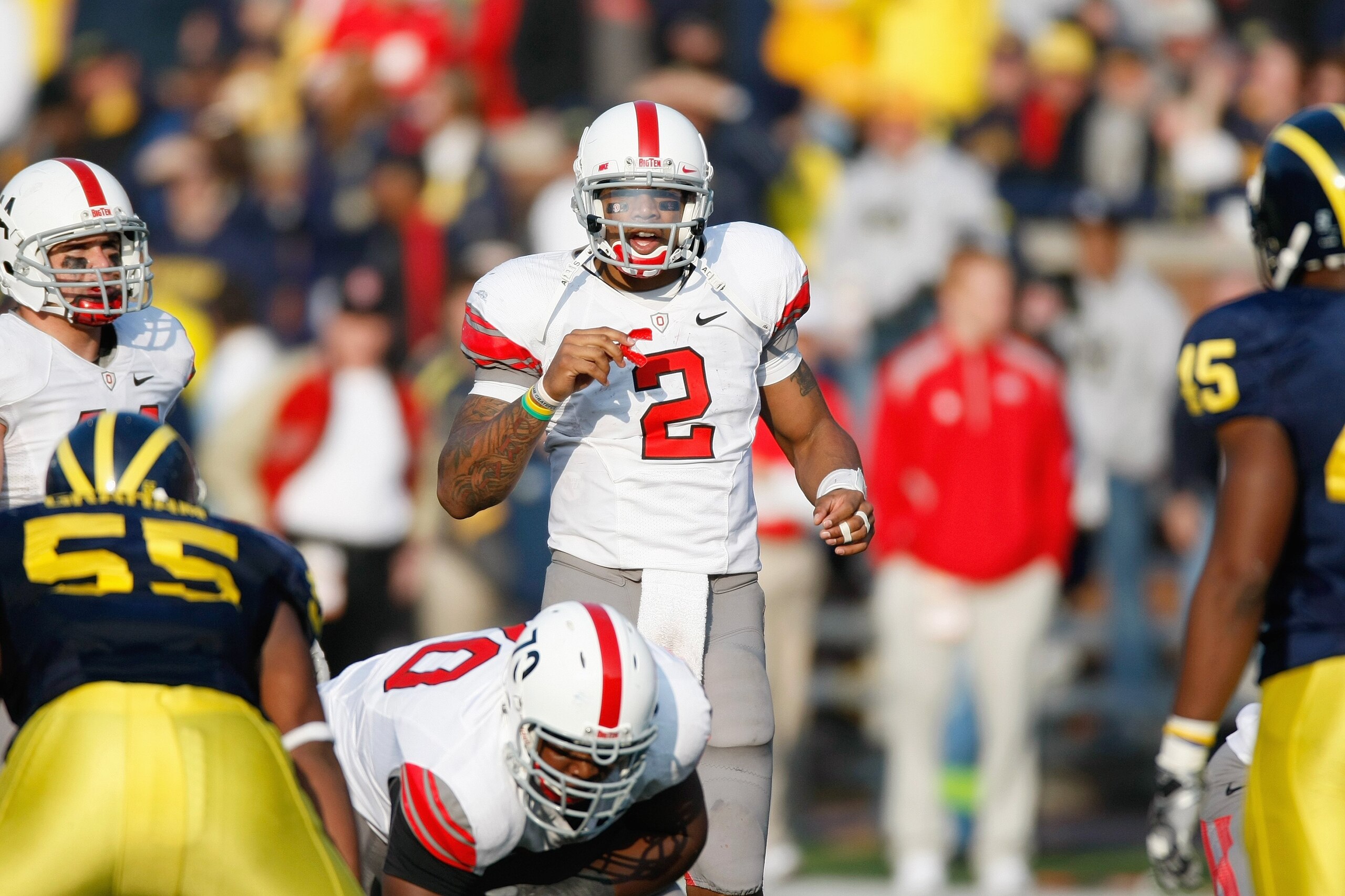 ANN ARBOR, MI - NOVEMBER 21: Quarterback Terrelle Pryor #2 of the Ohio State Buckeyes gets ready at the line of scrimmage during the game against the Michigan Wolverines on November 21, 2009 at Michigan Stadium in Ann Arbor, Michigan. Ohio State won the g