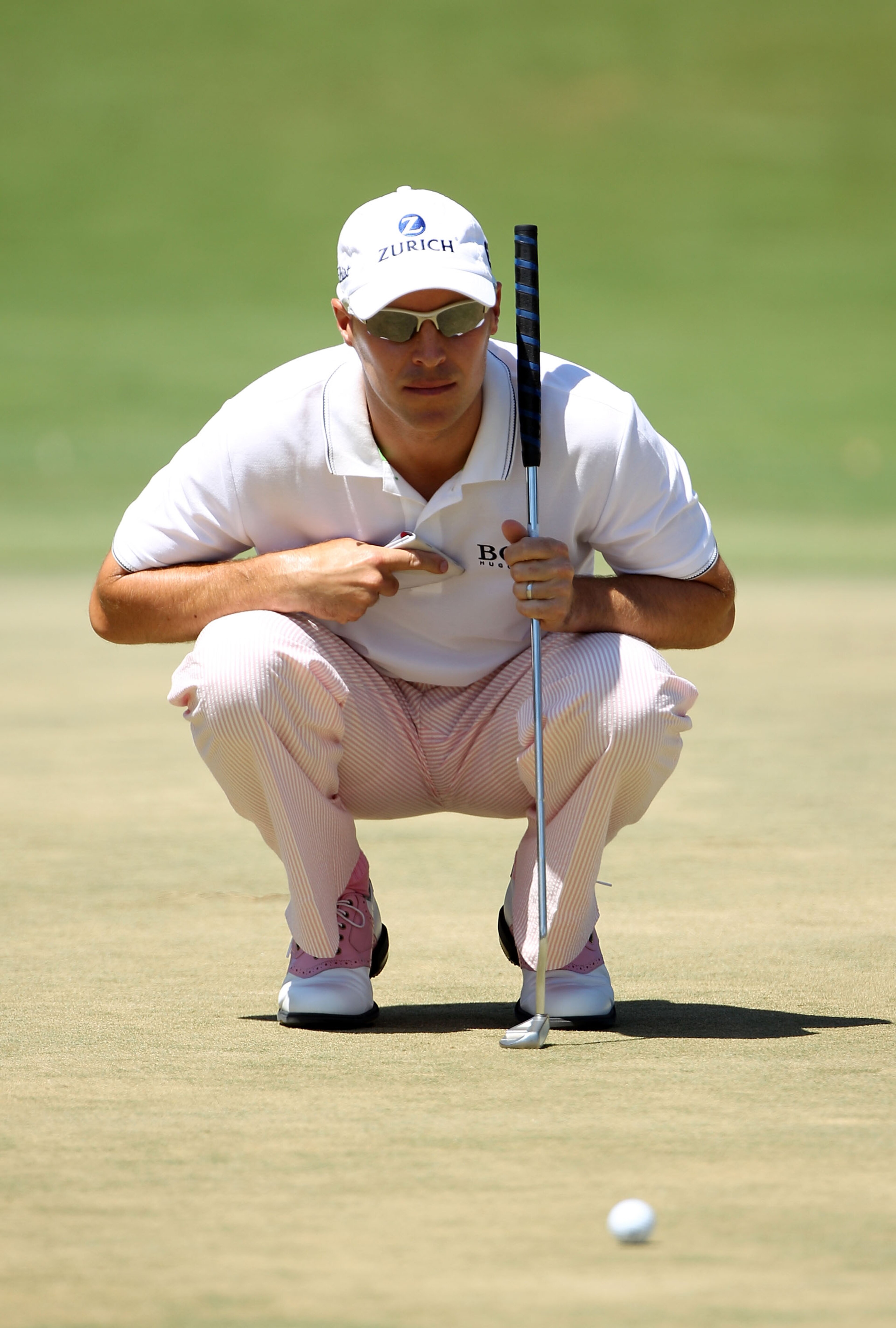 PONTE VEDRA BEACH, FL - MAY 09:  Ben Crane lines up a putt during the final round of THE PLAYERS Championship held at THE PLAYERS Stadium course at TPC Sawgrass on May 9, 2010 in Ponte Vedra Beach, Florida.  (Photo by Scott Halleran/Getty Images)