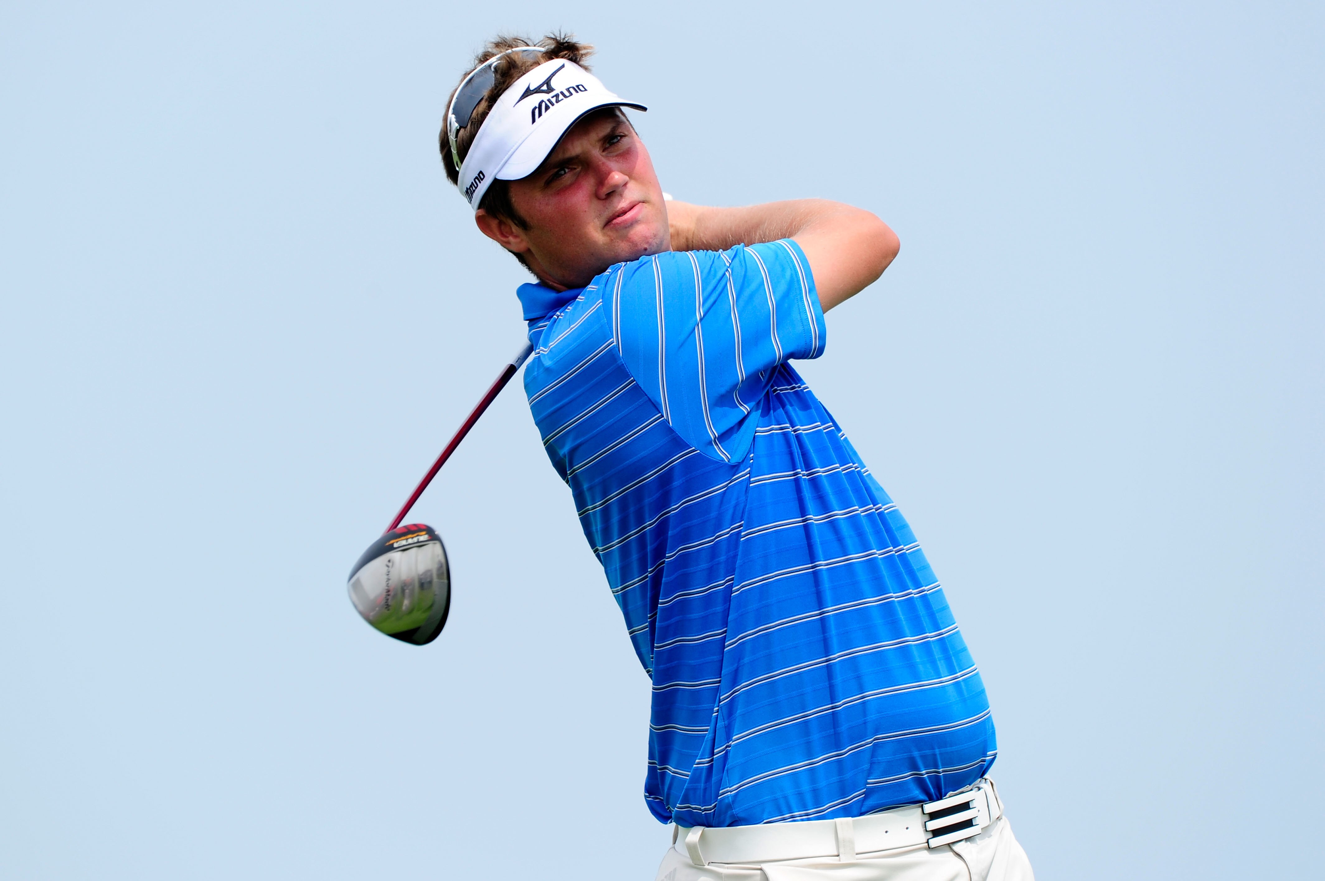 KOHLER, WI - AUGUST 10:  Jeff Overton hits a shot during a practice round prior to the start of the 92nd PGA Championship on the Straits Course at Whistling Straits on August 10, 2010 in Kohler, Wisconsin.  (Photo by Stuart Franklin/Getty Images)