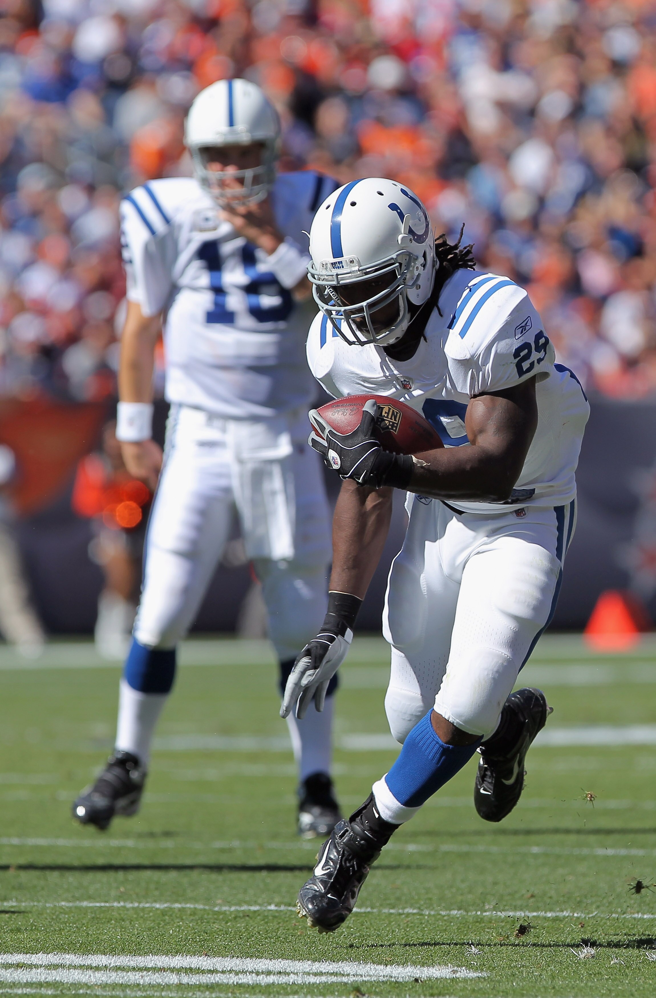 DENVER - SEPTEMBER 26:  Running back Joseph Addai #29 of the Indianapolis Colts rushes against the Denver Broncos at INVESCO Field at Mile High on September 26, 2010 in Denver, Colorado.  (Photo by Doug Pensinger/Getty Images)