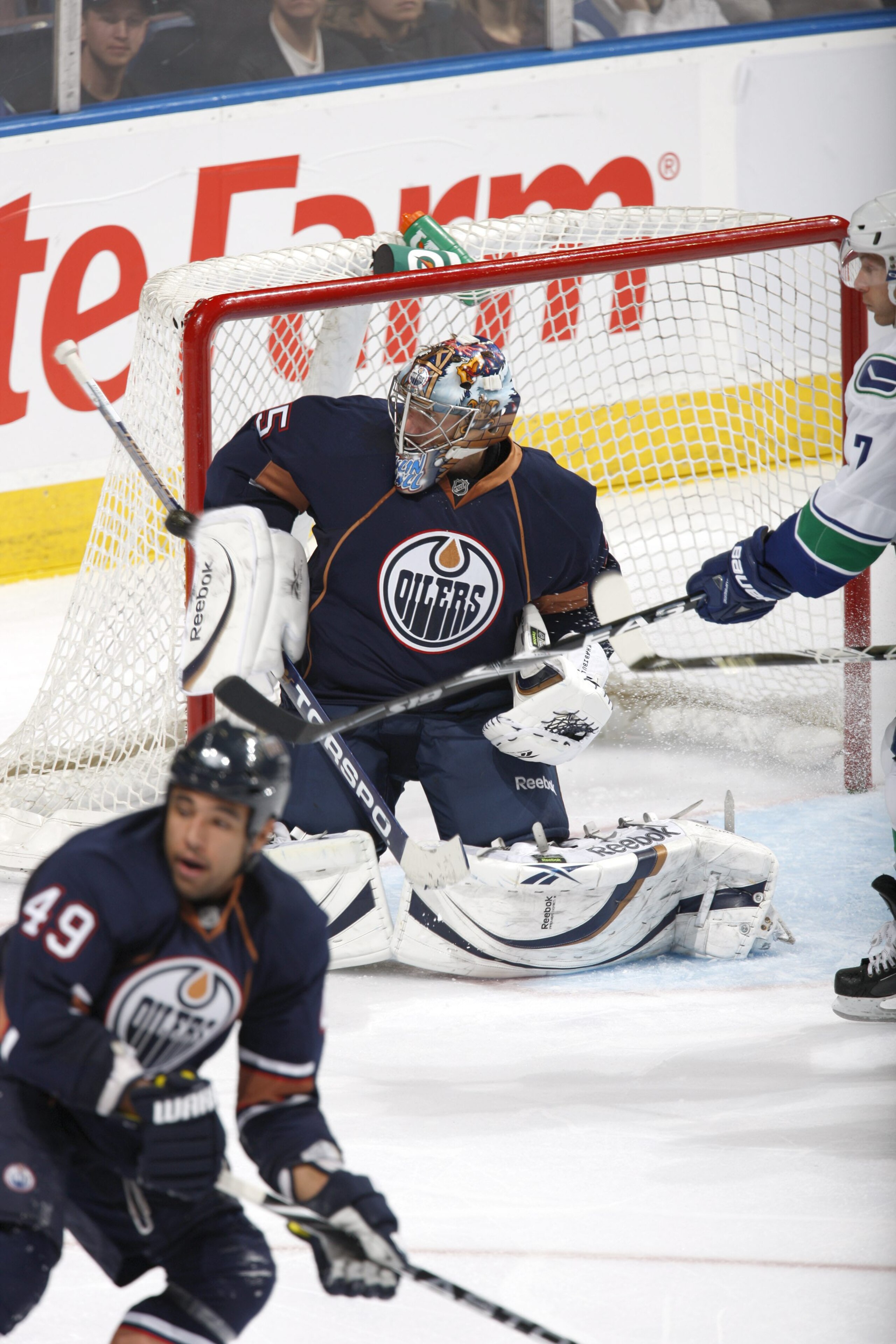 EDMONTON, CANADA - SEPTEMBER 26: Nikolai Khabibulin #35 of the Edmonton Oilers skates against the Vancouver Canucks on September 26, 2010 at Rexall Place in Edmonton, Alberta, Canada. (Photo by Dale MacMillan/Getty Images) EDMONTON, CANADA - SEPTEMBER 26: Nikolai Khabibulin #35 of the Edmonton Oilers skates against the Vancouver Canucks on September 26, 2010 at Rexall Place in Edmonton, Alberta, Canada. (Photo by Dale MacMillan/Getty Images)