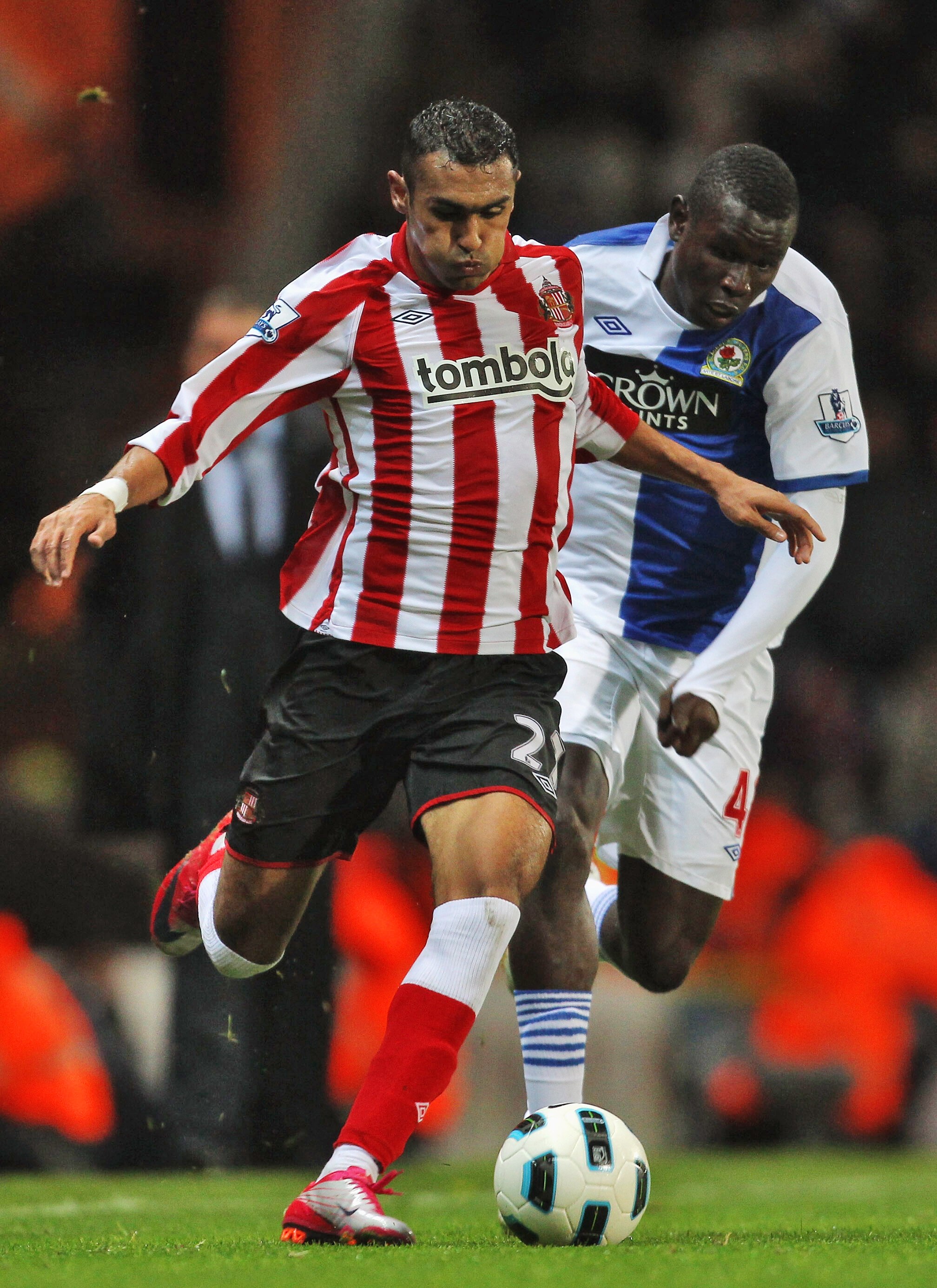 BLACKBURN, ENGLAND - OCTOBER 18:  Ahmed Elmohamady of Sunderland beats Mame Biram Diouf of Blackburn Rovers during the Barclays Premier League match between Blackburn Rovers and Sunderland  at Ewood park on October 18, 2010 in Blackburn, England.  (Photo 