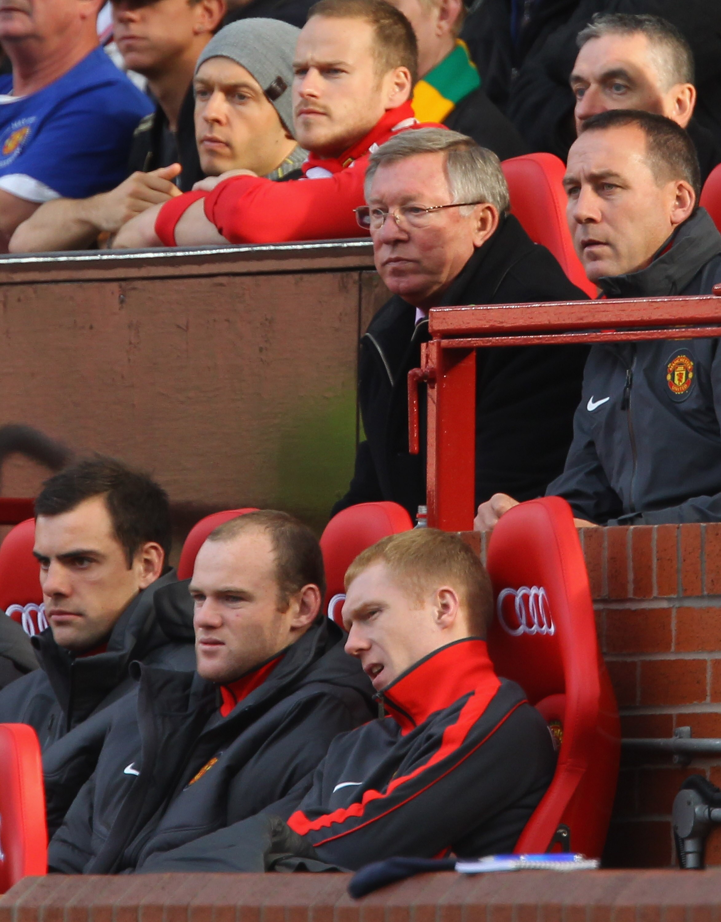 MANCHESTER, ENGLAND - OCTOBER 16:  Sir Alex Ferguson the manager of Manchester United and Wayne Rooney look on from the bench during the Barclays Premier League match between Manchester United and West Bromwich Albion at Old Trafford on October 16, 2010 i