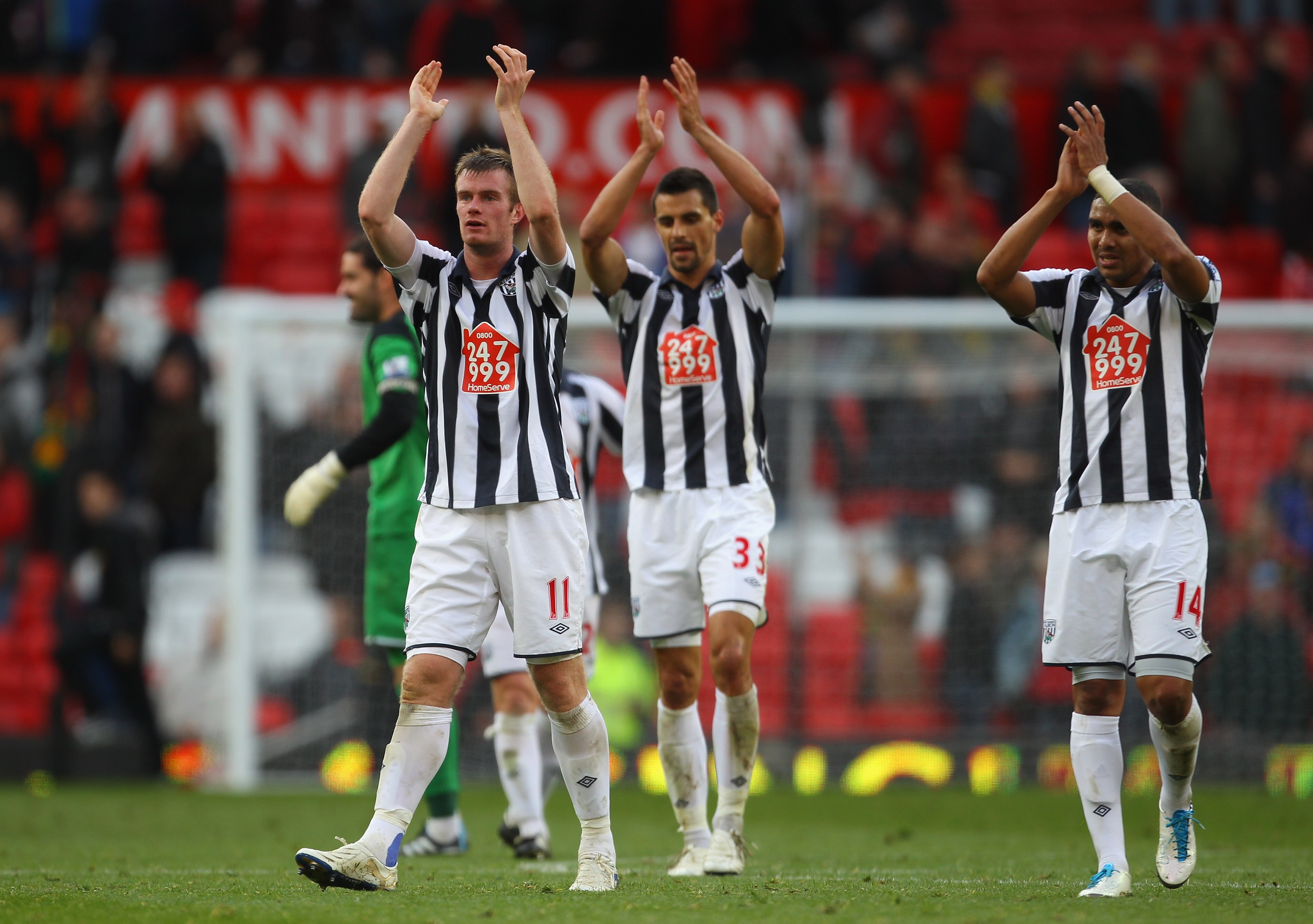 MANCHESTER, ENGLAND - OCTOBER 16:  West Bromwich Albion players applaud their supporters after the Barclays Premier League match between Manchester United and West Bromwich Albion at Old Trafford on October 16, 2010 in Manchester, England.  (Photo by Alex