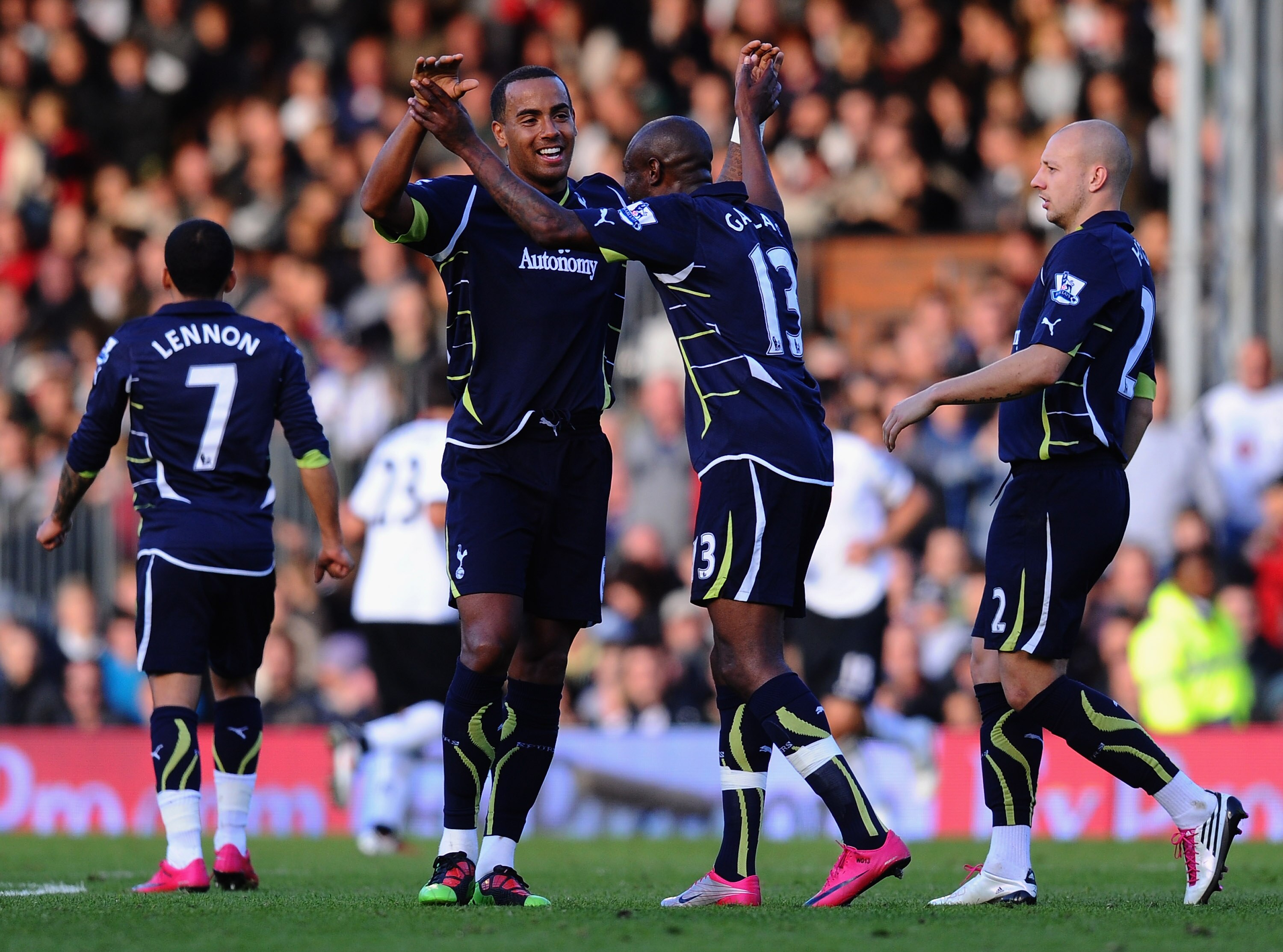 LONDON, ENGLAND - OCTOBER 16:  Tom Huddlestone of Tottenham celebrates with team mate William Gallas after scoring during the Barclays Premier League match between Fulham and Tottenham Hotspur at Craven Cottage on October 16, 2010 in London, England.  (Ph