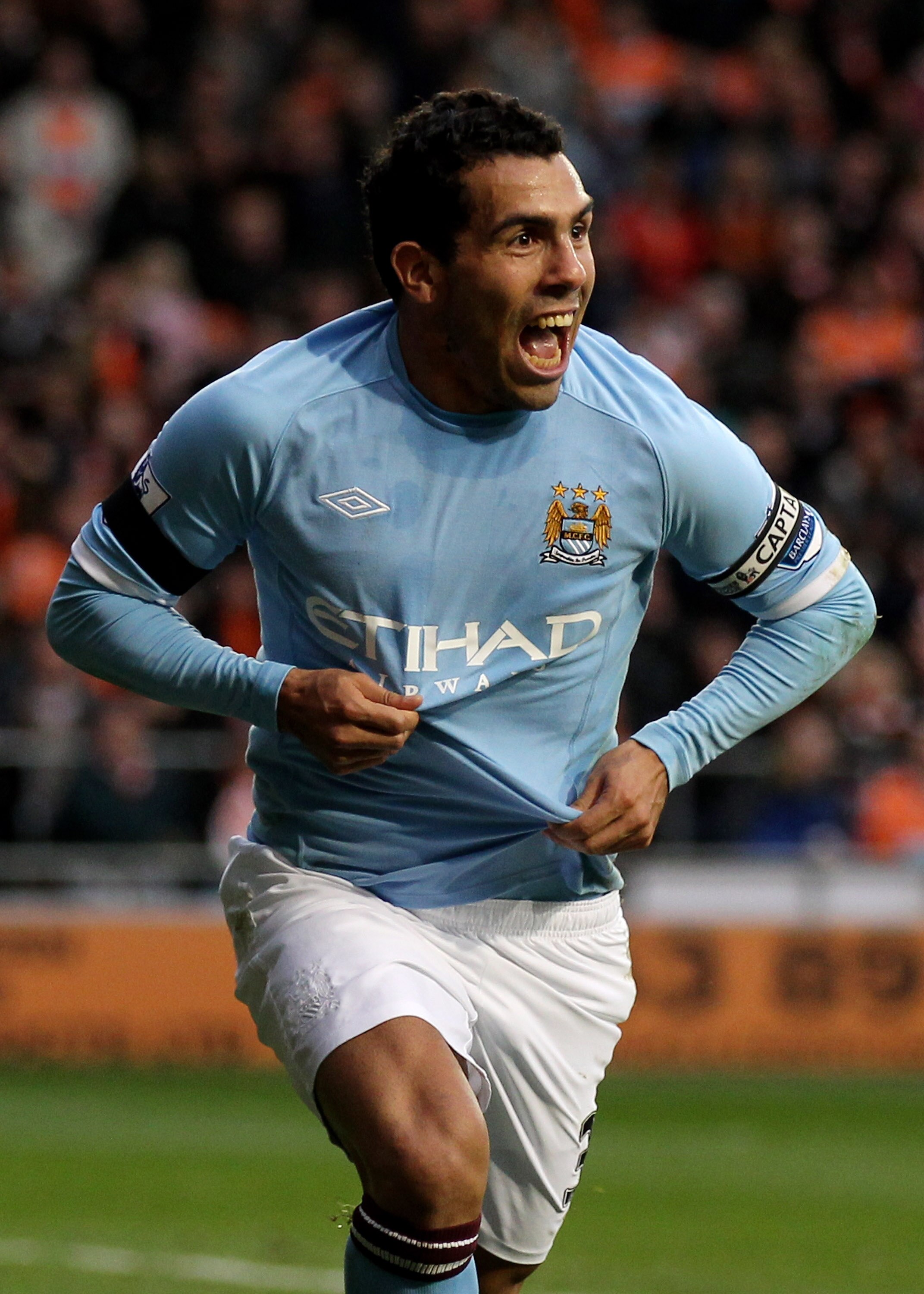 BLACKPOOL, ENGLAND - OCTOBER 17:  Carlos Tevez of Manchester City celebrates scoring the opening goal during the Barclays Premiership match between Blackpool and Manchester City at Bloomfield Road on October 17, 2010 in Blackpool, England.  (Photo by Alex