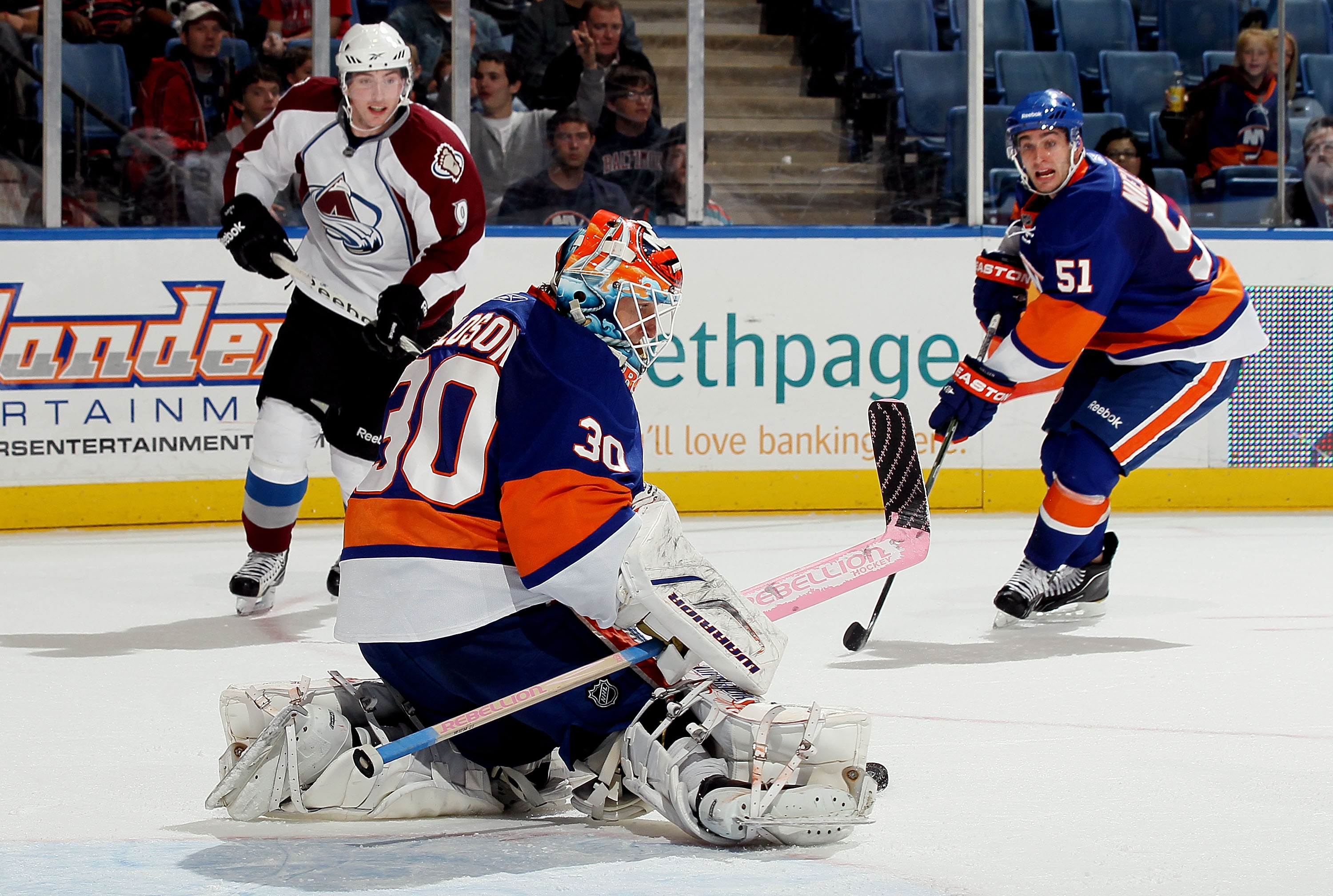 UNIONDALE, NY - OCTOBER 16: Dwayne Roloson #30 of the New York Islanders makes a save against the Colorado Avalanche on October 16, 2010 at Nassau Coliseum in Uniondale, New York. The Isles defeated the Avalanche 5-2. (Photo by Jim McIsaac/Getty Images) UNIONDALE, NY - OCTOBER 16: Dwayne Roloson #30 of the New York Islanders makes a save against the Colorado Avalanche on October 16, 2010 at Nassau Coliseum in Uniondale, New York. The Isles defeated the Avalanche 5-2. (Photo by Jim McIsaac/Getty Images)