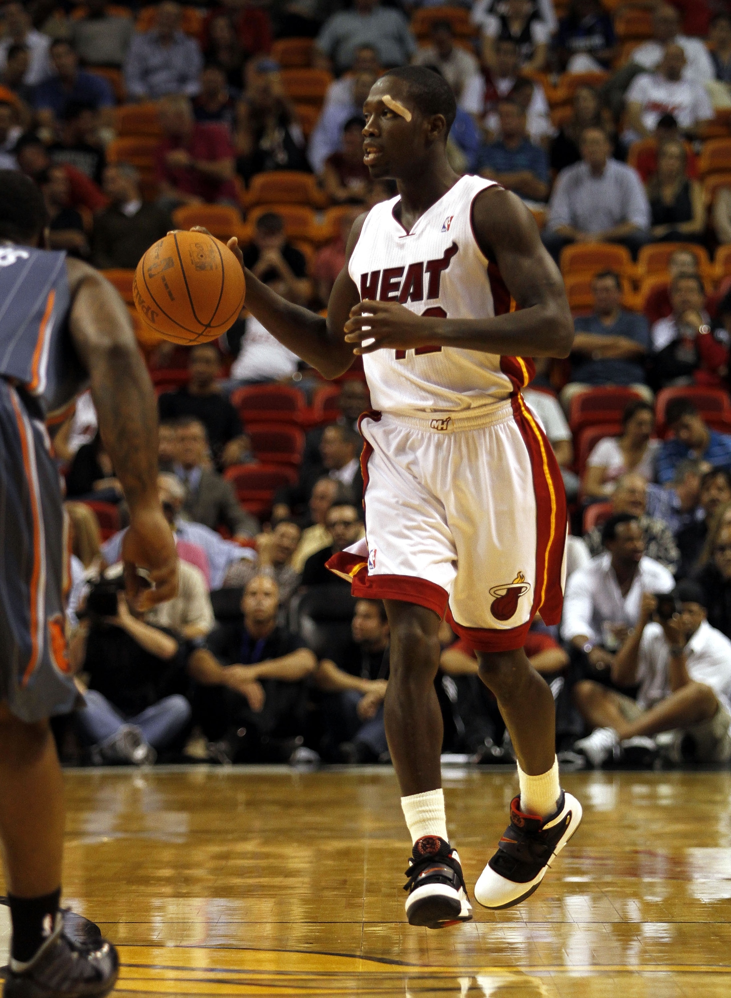 MIAMI - OCTOBER 18:  Guard Patrick Beverley #12  of the Miami Heat brings up the ball against the Charlotte Bobcats on October 18, 2010 at American Airlines Arena in Miami, Florida. NOTE TO USER: User expressly acknowledges and agrees that, by downloading