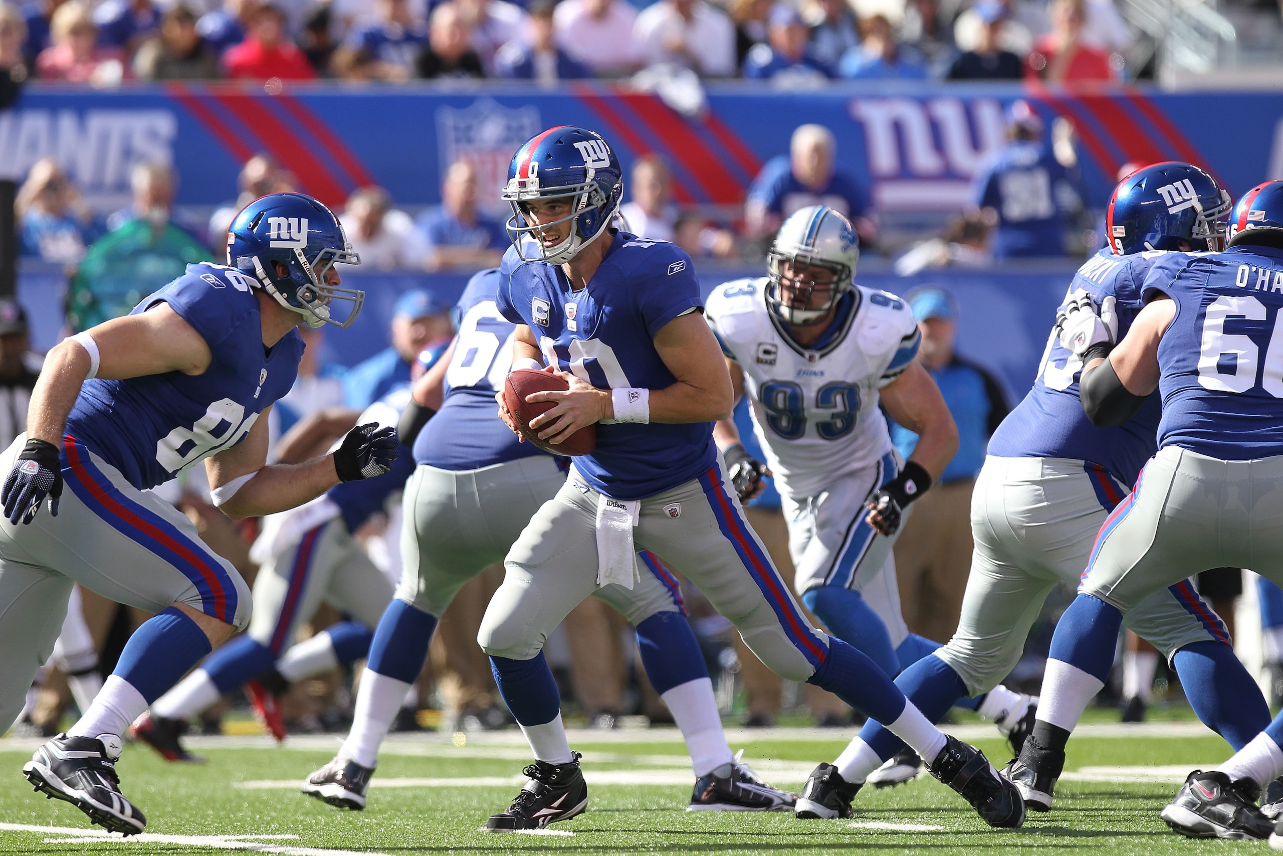 EAST RUTHERFORD, NJ - OCTOBER 17:  Eli Manning #10 of the New York Giants passes against the Detroit Lions at New Meadowlands Stadium on October 17, 2010 in East Rutherford, New Jersey.  (Photo by Nick Laham/Getty Images)