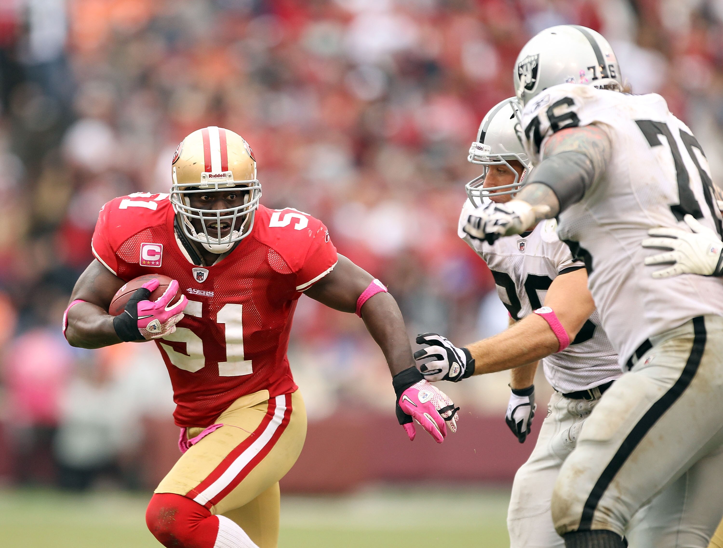 SAN FRANCISCO - OCTOBER 17:  Takeo Spikes #51 of the San Francisco 49ers returns an interception during their game against the Oakland Raiders at Candlestick Park on October 17, 2010 in San Francisco, California.  (Photo by Ezra Shaw/Getty Images)