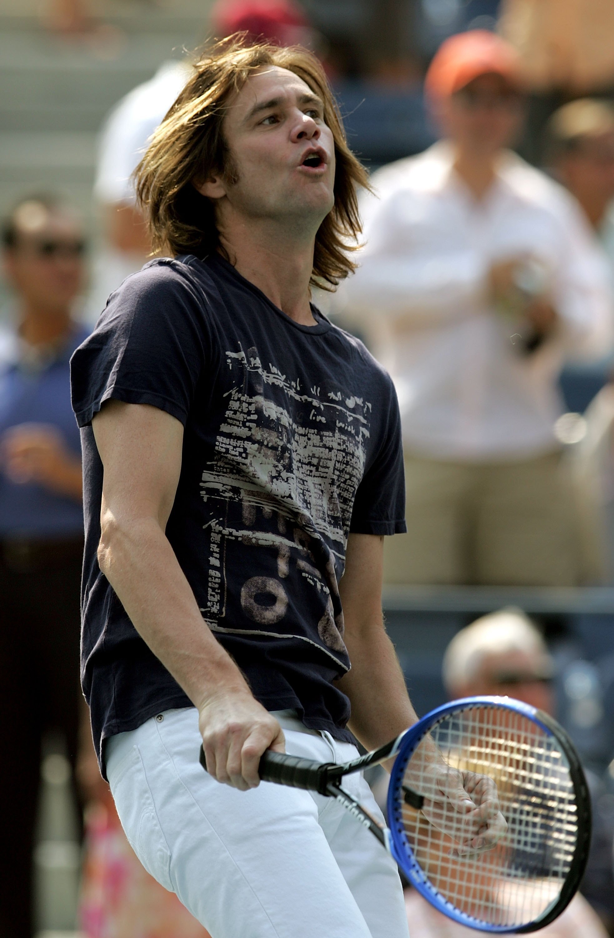 NEW YORK - SEPTEMBER 09:  Actor Jim Carrey hits balls to fans before Andy Roddick takes on Mikhail Youzhny of Russia in the men's semi-final at the U.S. Open at the USTA Billie Jean King National Tennis Center in Flushing Meadows Corona Park on September