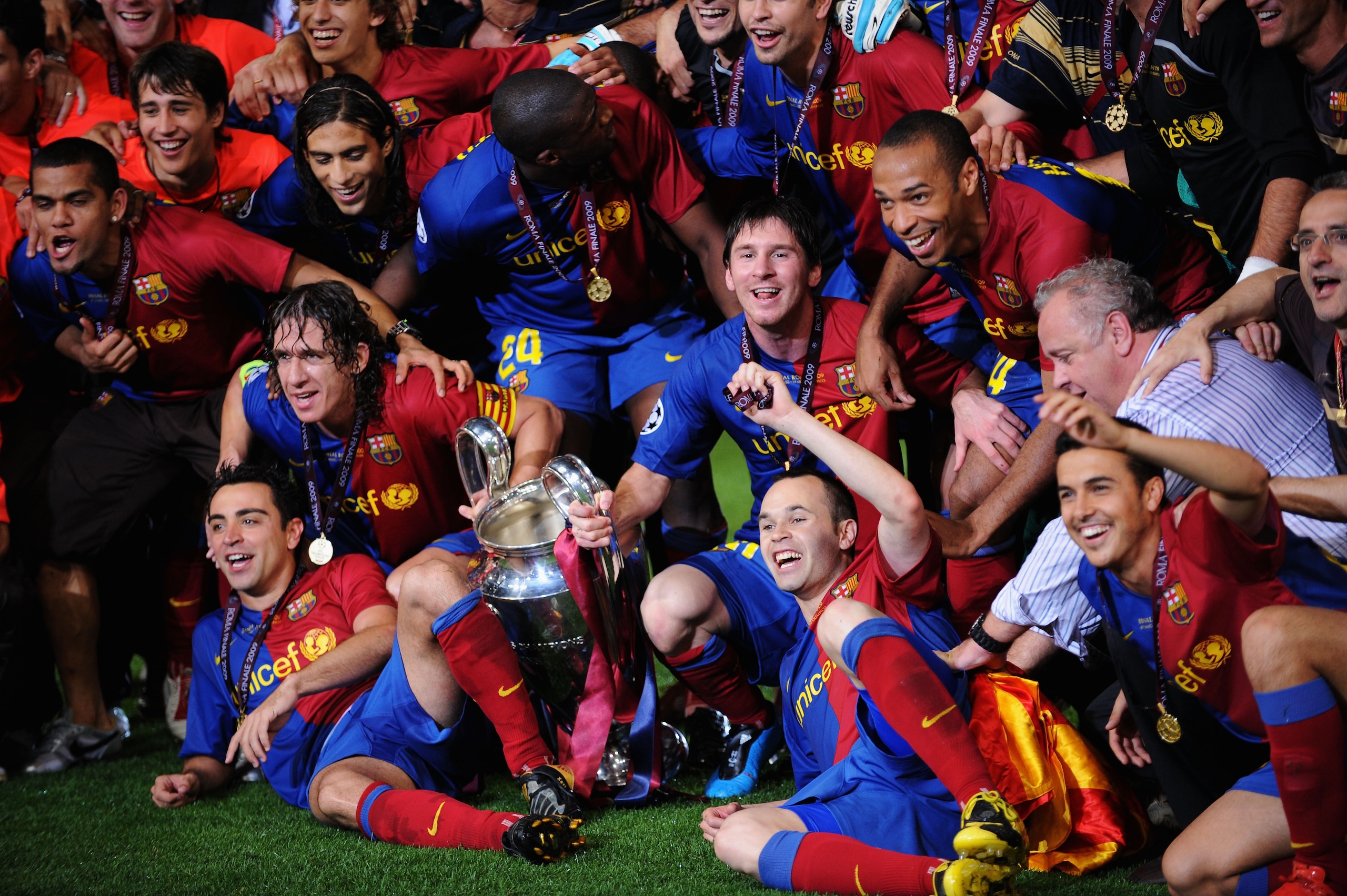 ROME - MAY 27: Barcelona players pose in front of the trophy after they celebrate winning the UEFA Champions League Final match between Barcelona and Manchester United at the Stadio Olimpico on May 27, 2009 in Rome, Italy. Barcelona won 2-0. (Photo by S ROME - MAY 27: Barcelona players pose in front of the trophy after they celebrate winning the UEFA Champions League Final match between Barcelona and Manchester United at the Stadio Olimpico on May 27, 2009 in Rome, Italy. Barcelona won 2-0. (Photo by S