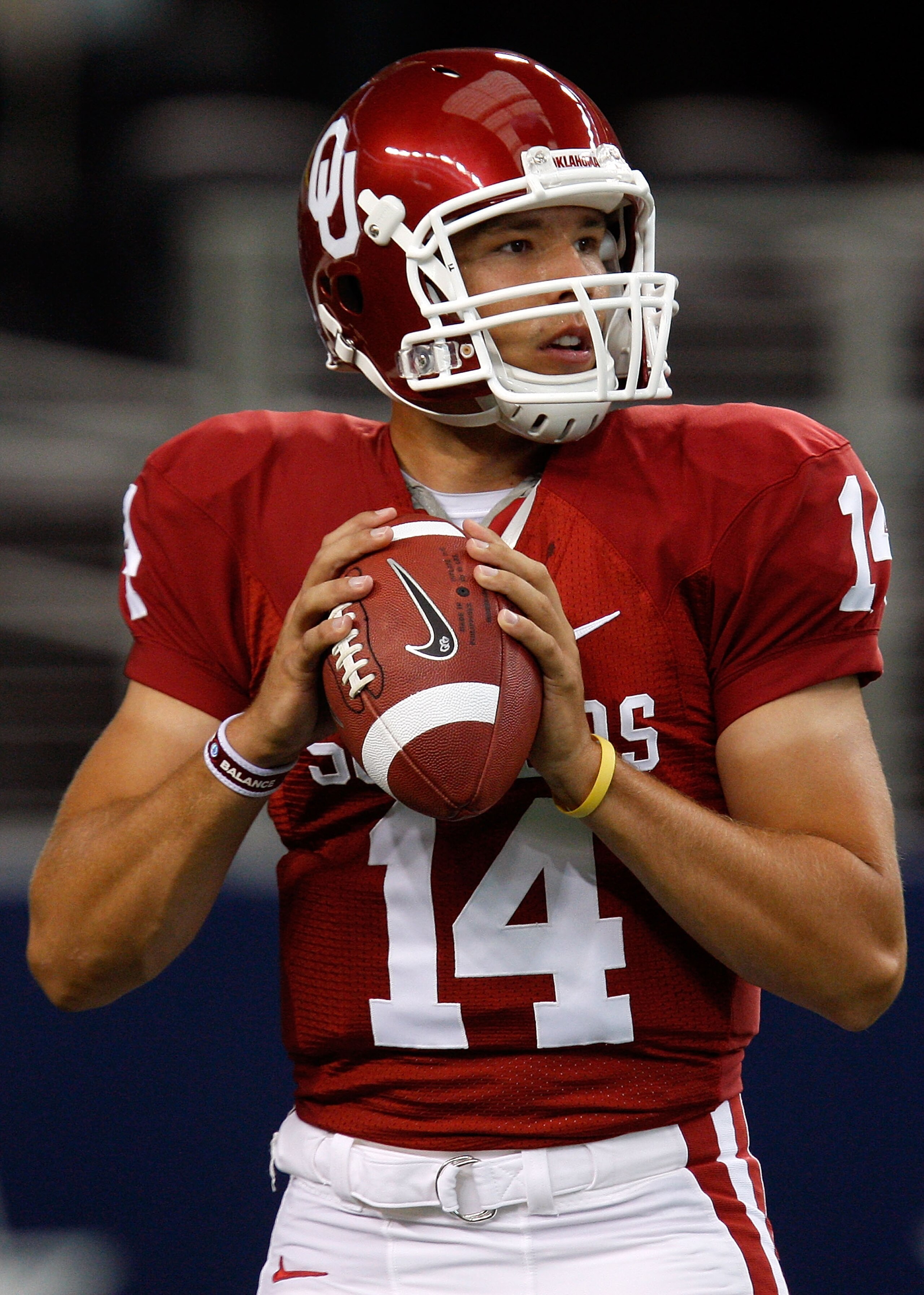 ARLINGTON, TX - SEPTEMBER 05:  Quarterback Sam Bradford #14 of the Oklahoma Sooners warms up before a game against the Brigham Young Cougars at Cowboys Stadium on September 5, 2009 in Arlington, Texas.  (Photo by Ronald Martinez/Getty Images)
