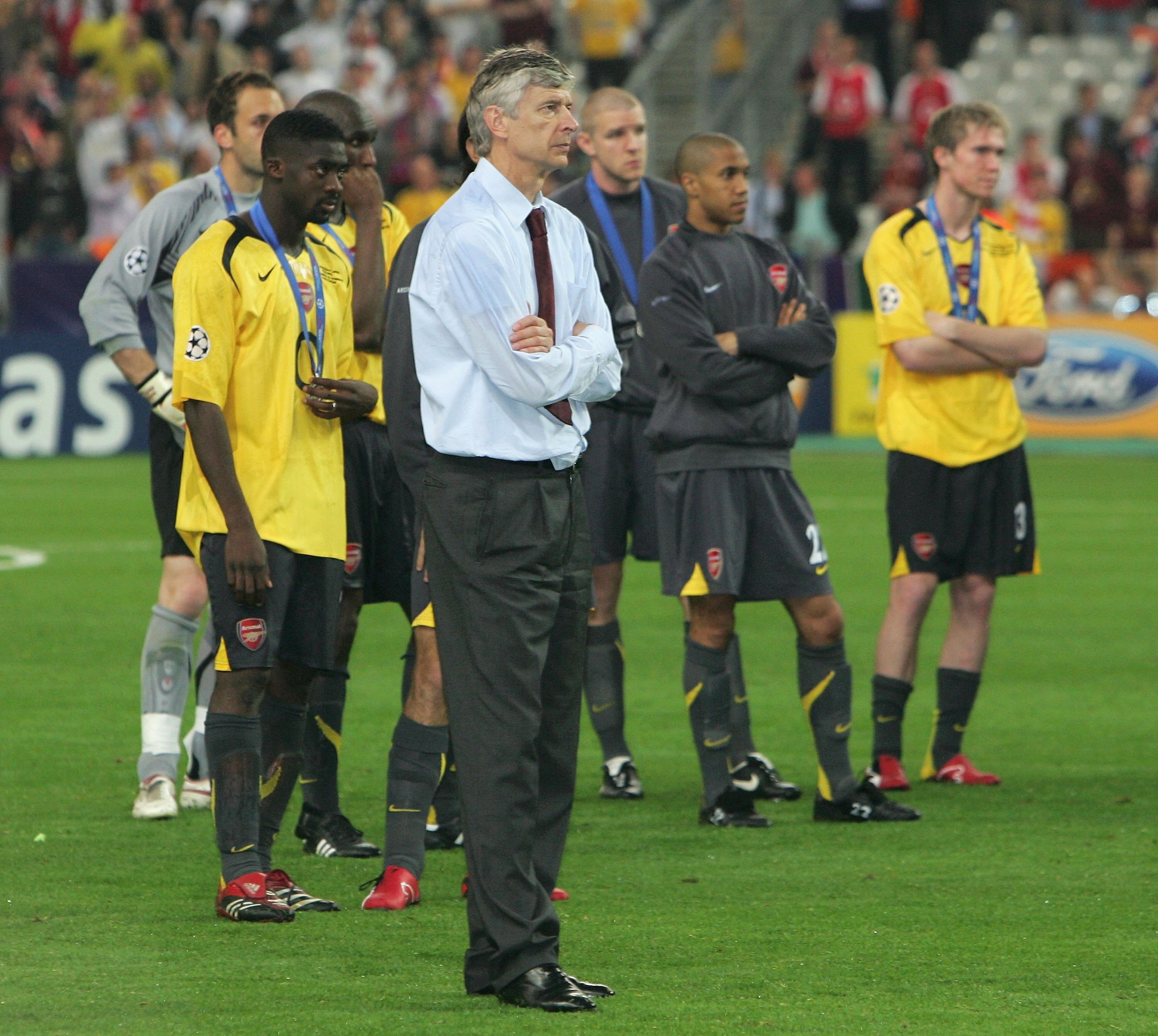 PARIS - MAY 17: Arsene Wenger of Arsenal shows his dissapointment in front of his team as Barcelona lift the trophy during the UEFA Champions League Final between Arsenal and Barcelona at the Stade de France on May 17, 2006 in Paris, France.  (Photo by La