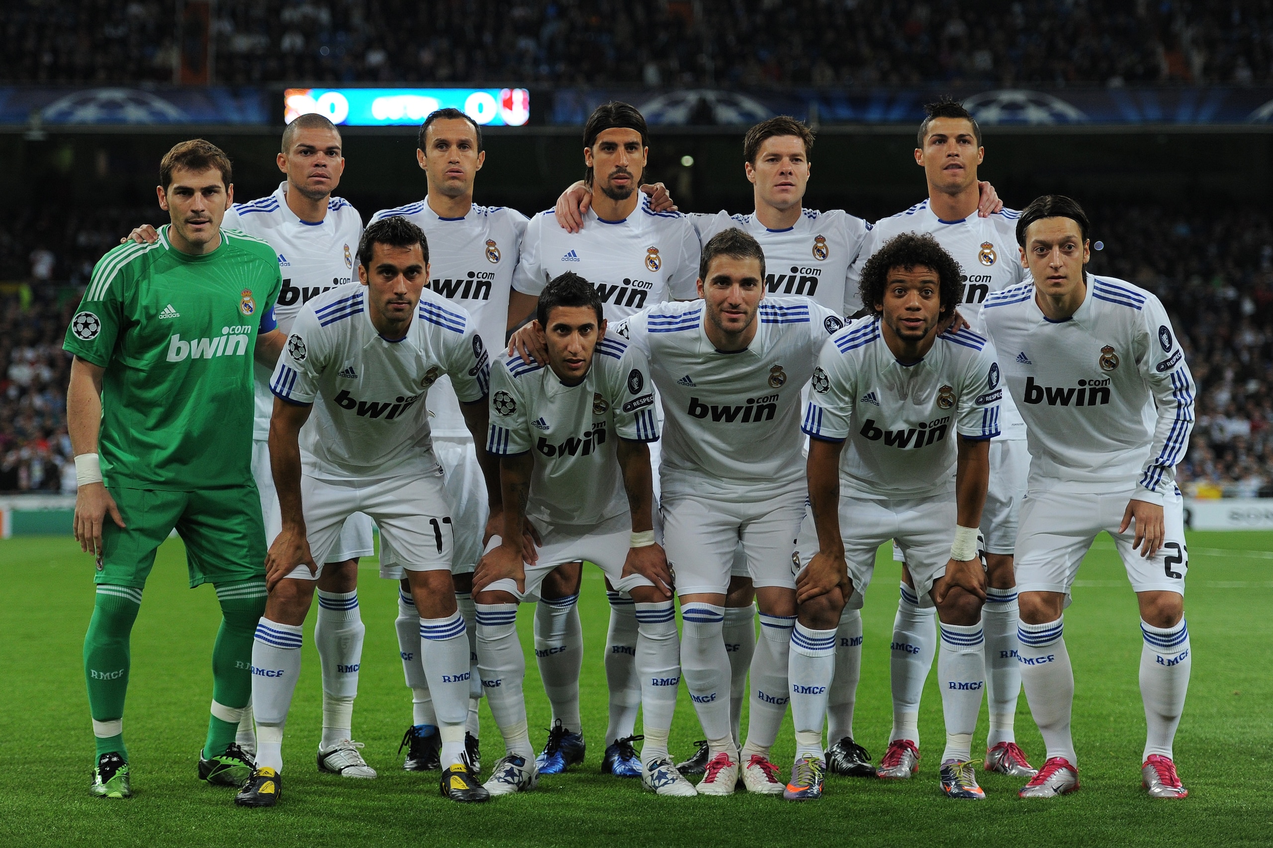 MADRID, SPAIN - OCTOBER 19: Real Madrid players (FLTR) Iker Casillas, Pepe, Alvaro Arbeloa, Ricardo Carvalho, Angel de Maria, Sami Khedira, Gonzalo Higuain, Xabi Alonso, Marcelo, Cristiano Ronaldo and Mesut Ozil pose for a team picture during the UEFA Ch MADRID, SPAIN - OCTOBER 19: Real Madrid players (FLTR) Iker Casillas, Pepe, Alvaro Arbeloa, Ricardo Carvalho, Angel de Maria, Sami Khedira, Gonzalo Higuain, Xabi Alonso, Marcelo, Cristiano Ronaldo and Mesut Ozil pose for a team picture during the UEFA Ch